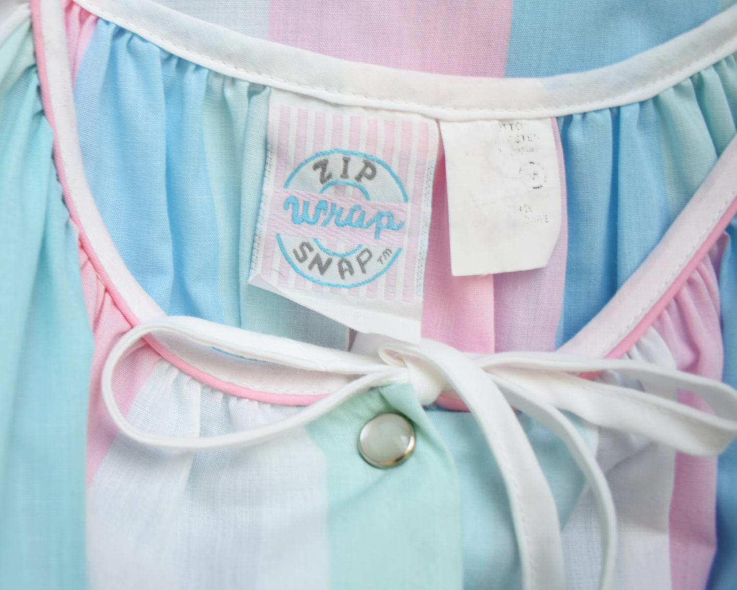 close up of the tag that says zip wrap snap