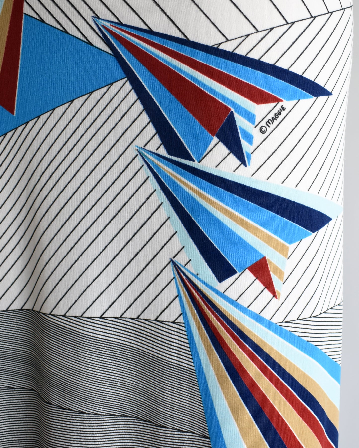 close up of the colorful paper planes print