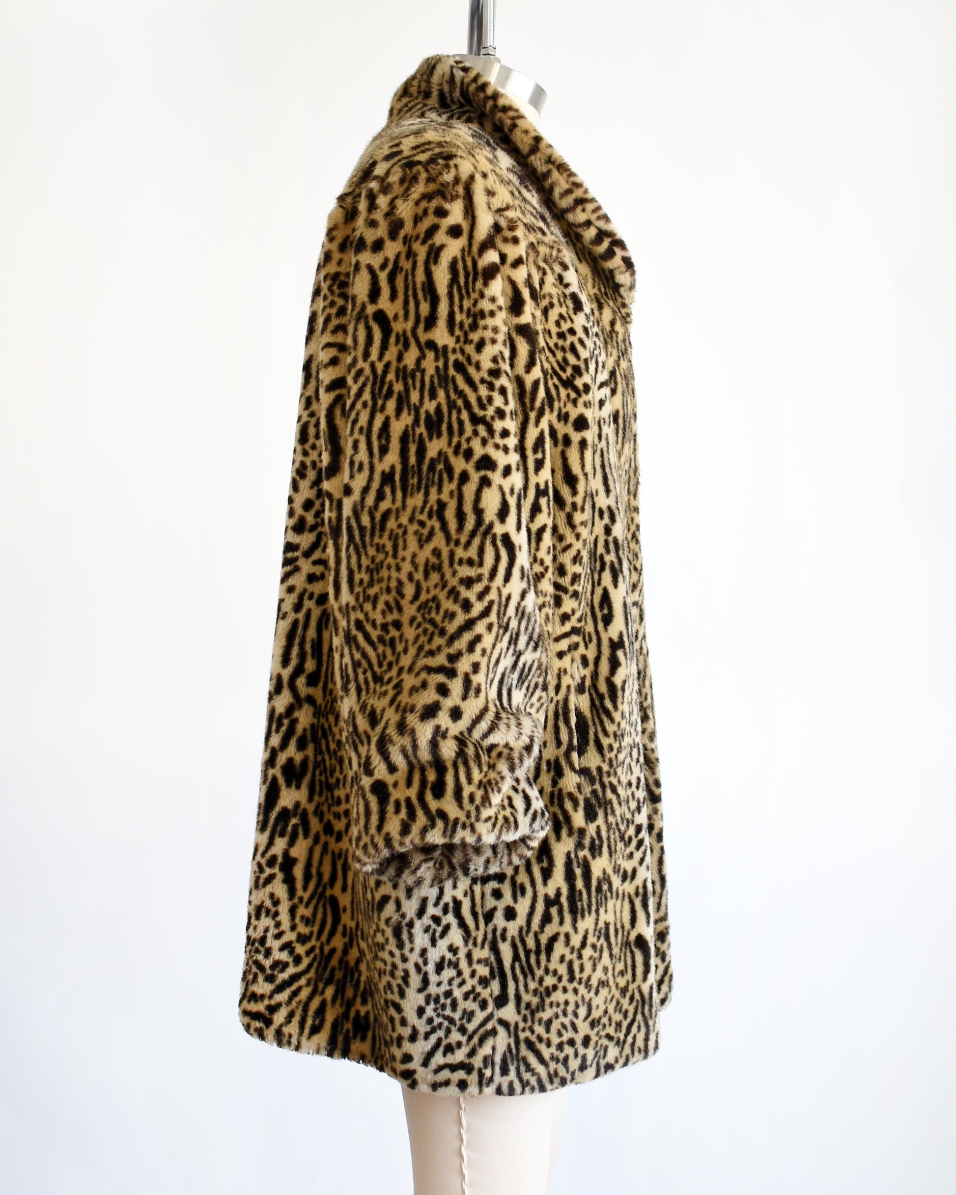 side view of a vintage 1970s faux fur leopard print coat