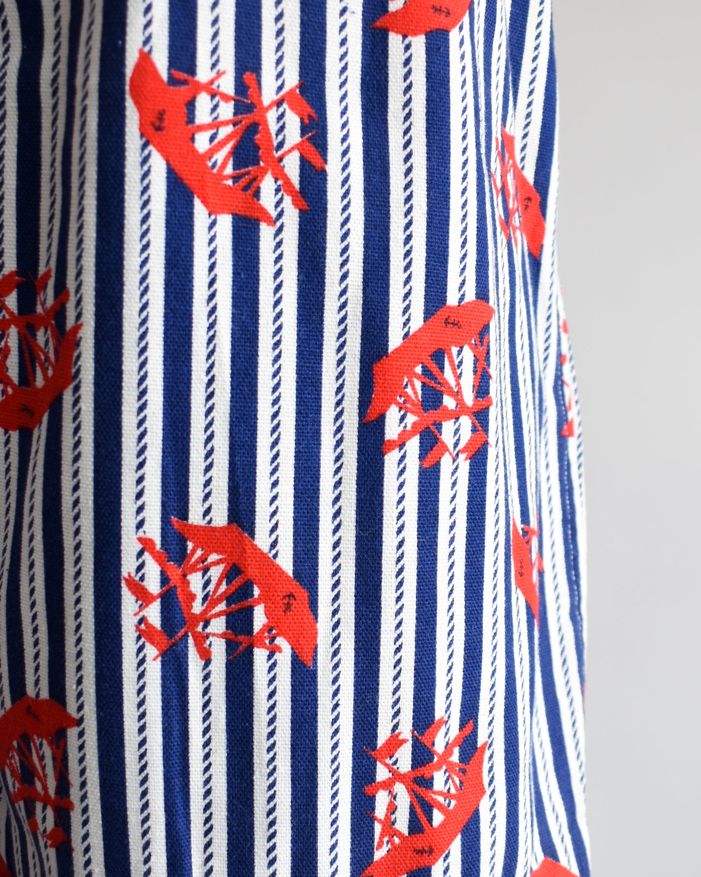 Close up of the stripes and red clipper ship print