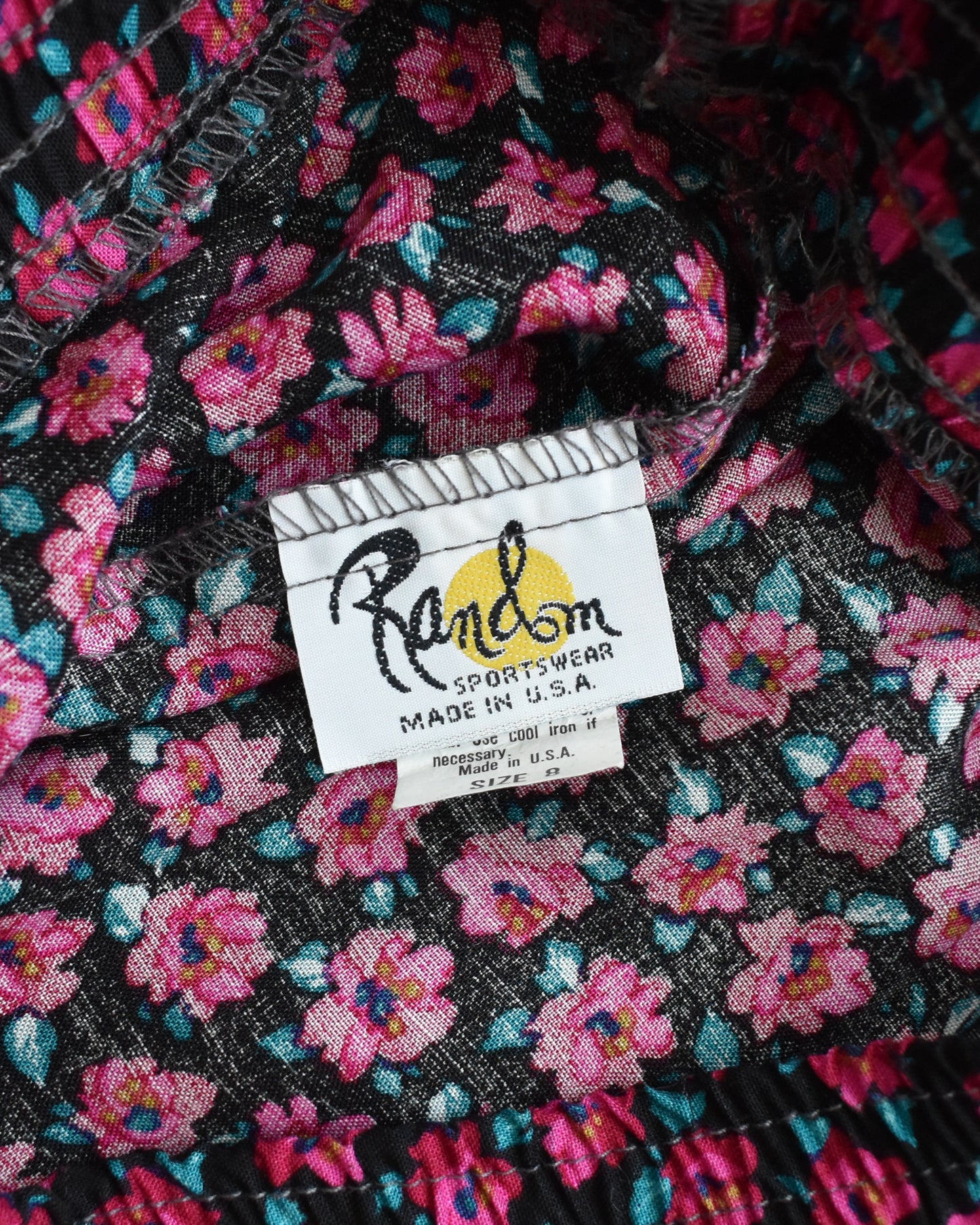Close-up of the label reading 'Random SPORTSWEAR MADE IN U.S.'