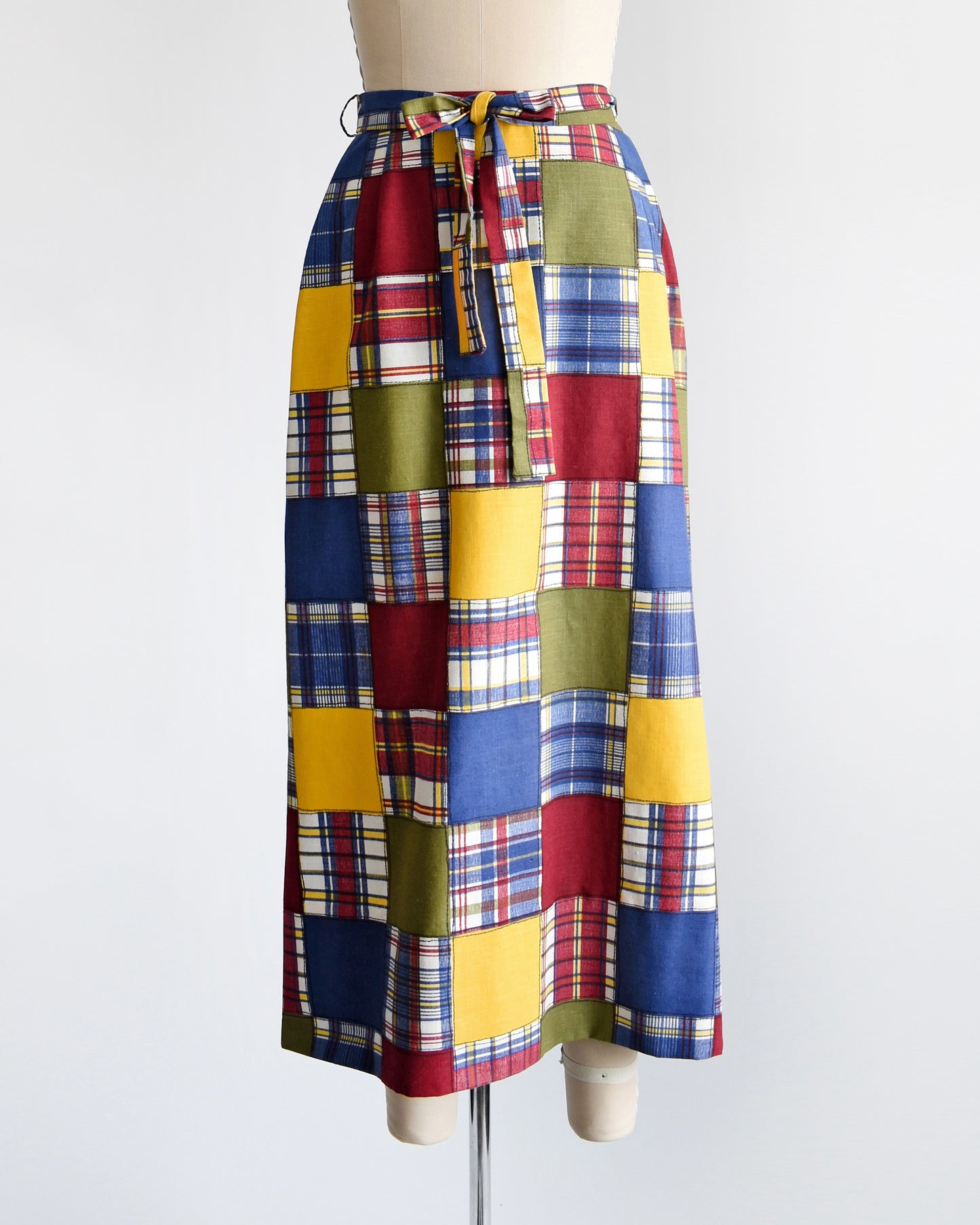 a vintage 1970s patchwork madras plaid maxi skirt with matching tie belt