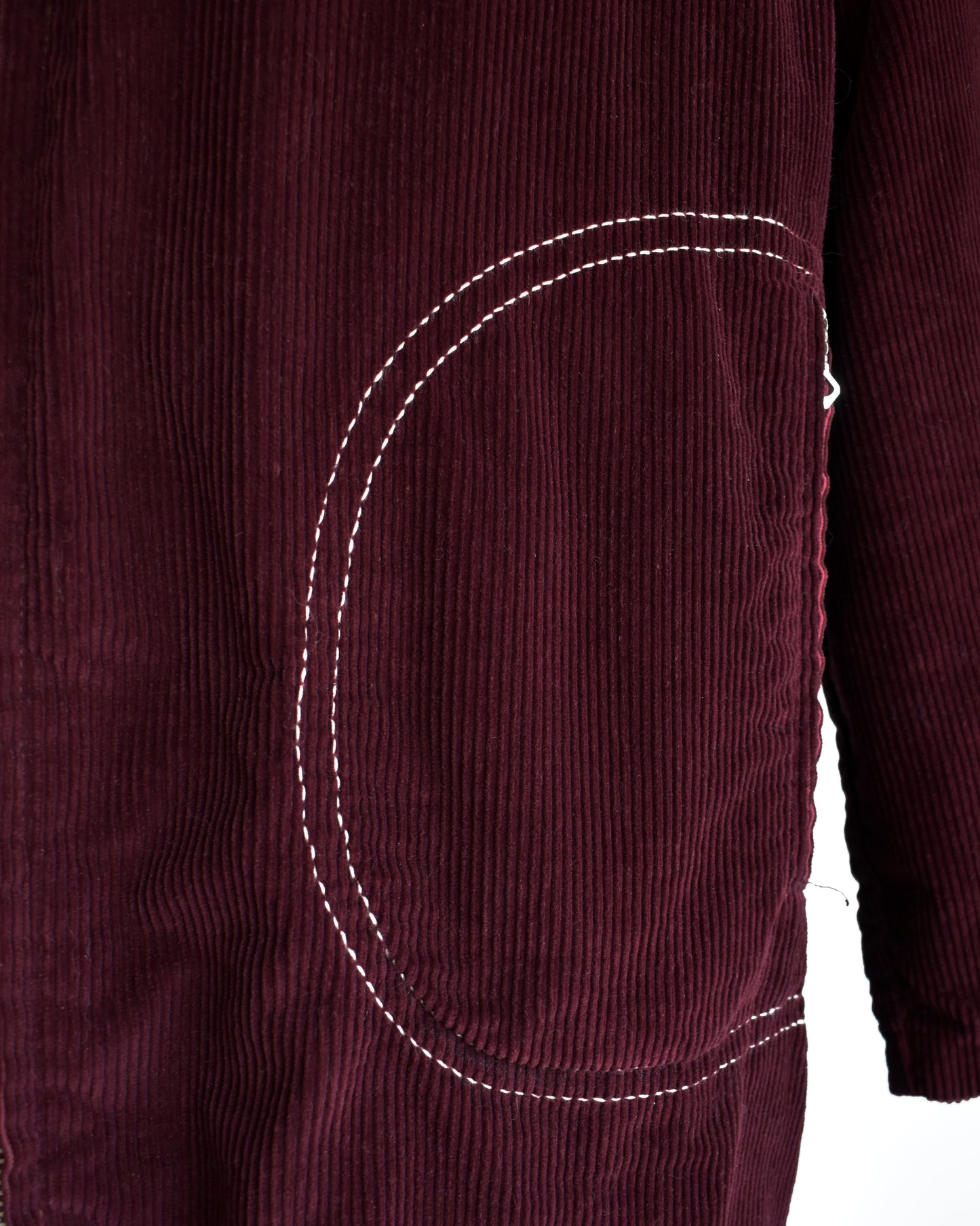 a close up photo of the white stitching on the pocket