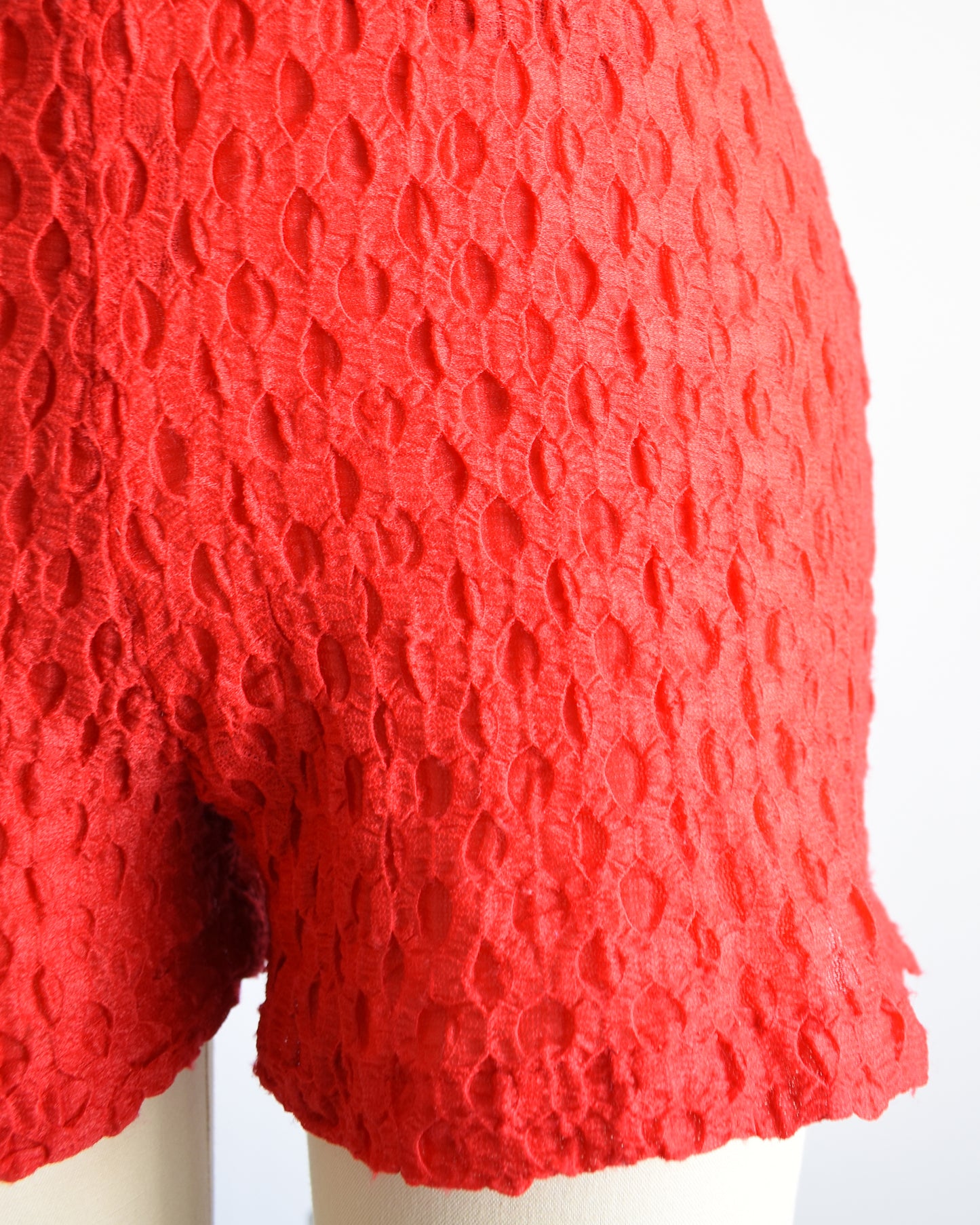 close up of the shorts hem on the bodysuit/romper