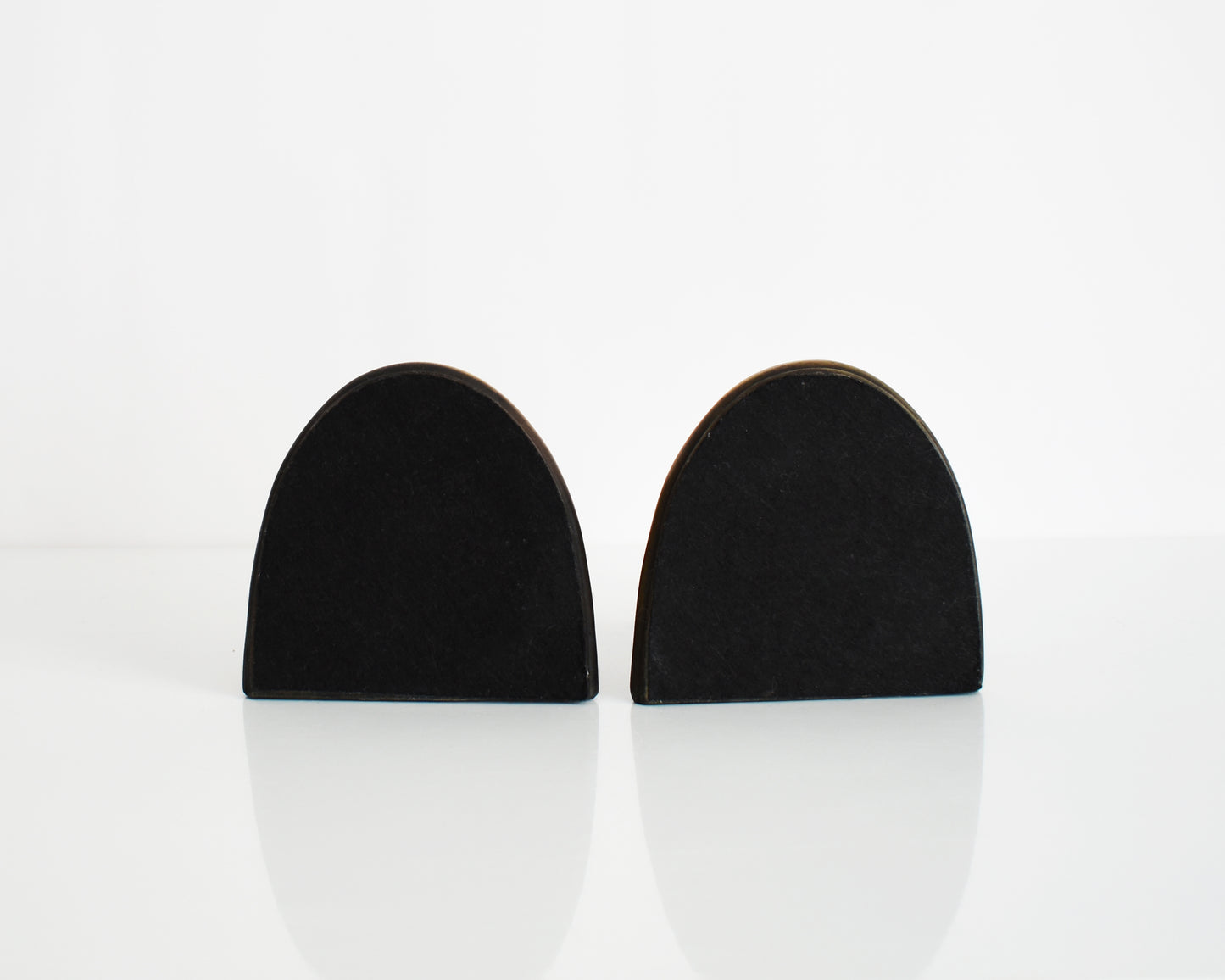 The underside of the bookends showing the black felt bottom