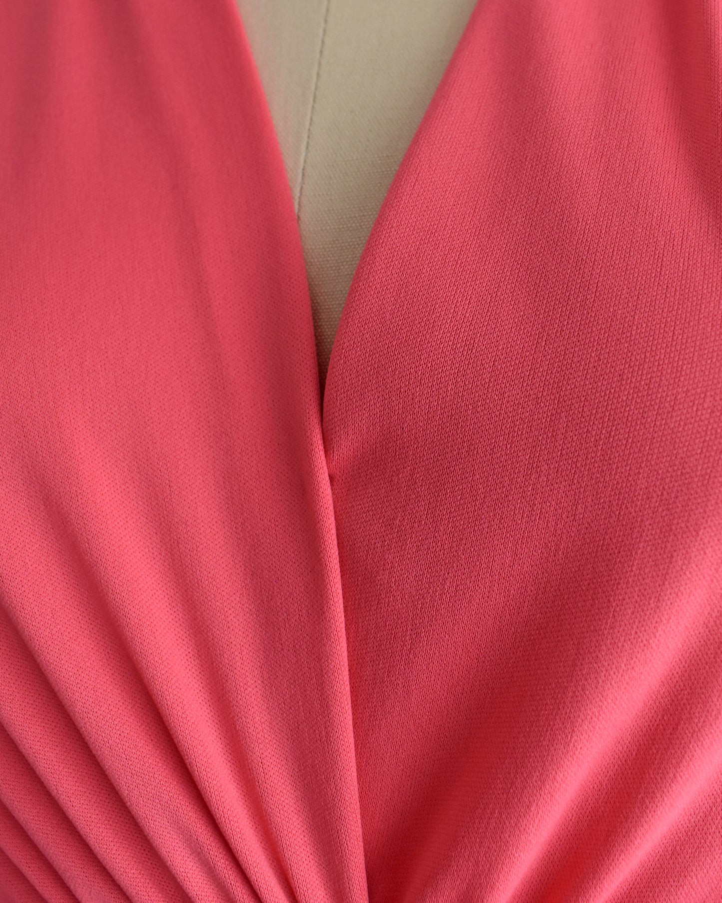 Close up of the v neckline that is stitched closed with a few stitches
