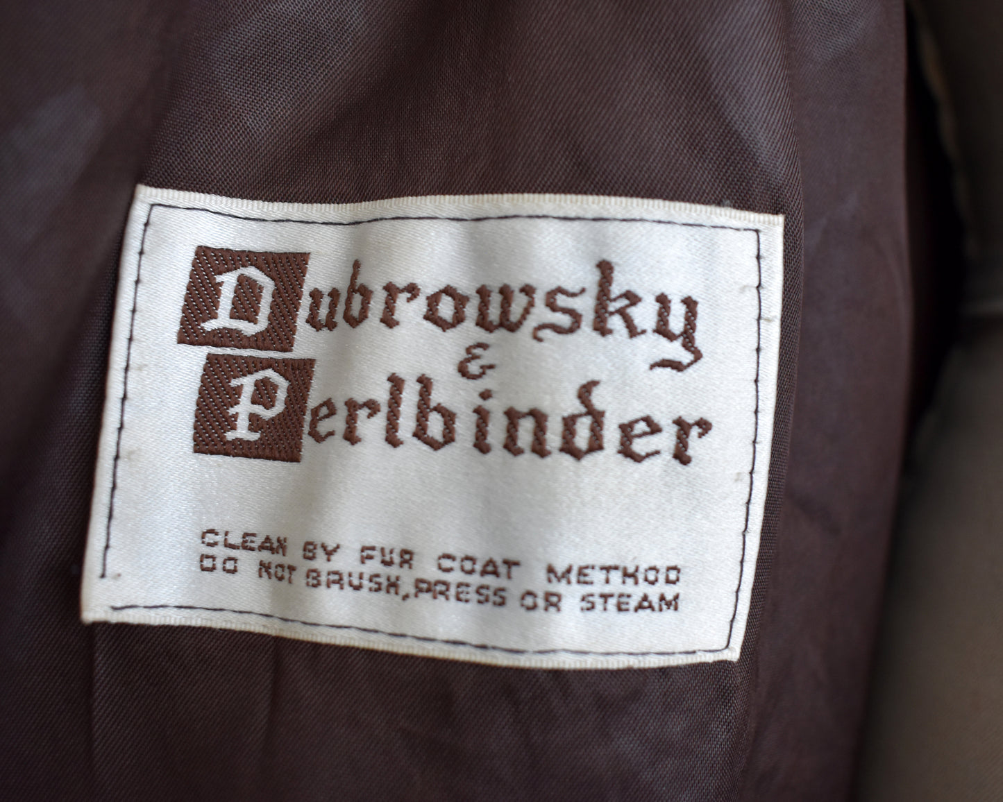 close up of the tag which says Dubrowsky & Perlbinder