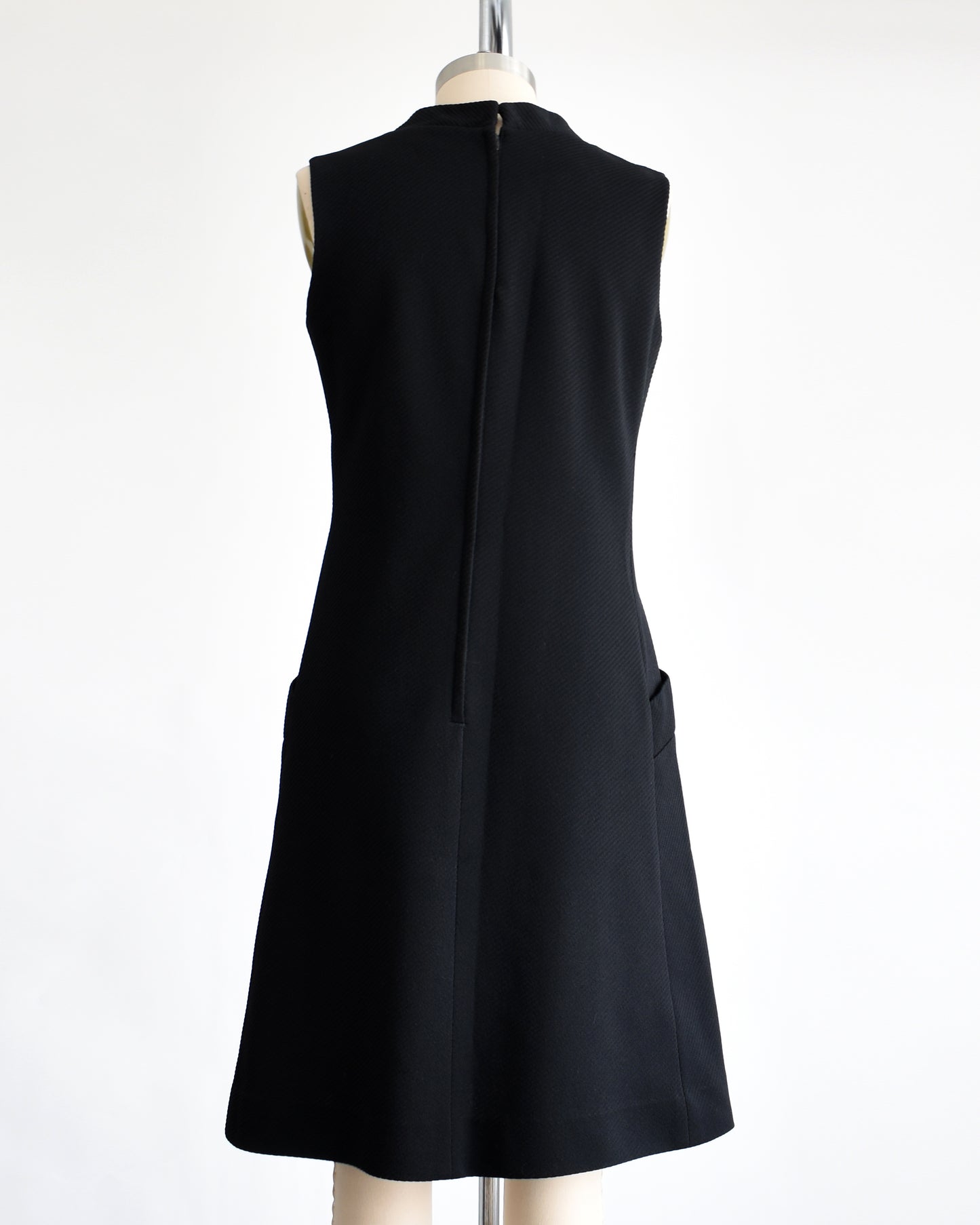 back view of a vintage 1960s black mod scooter dress