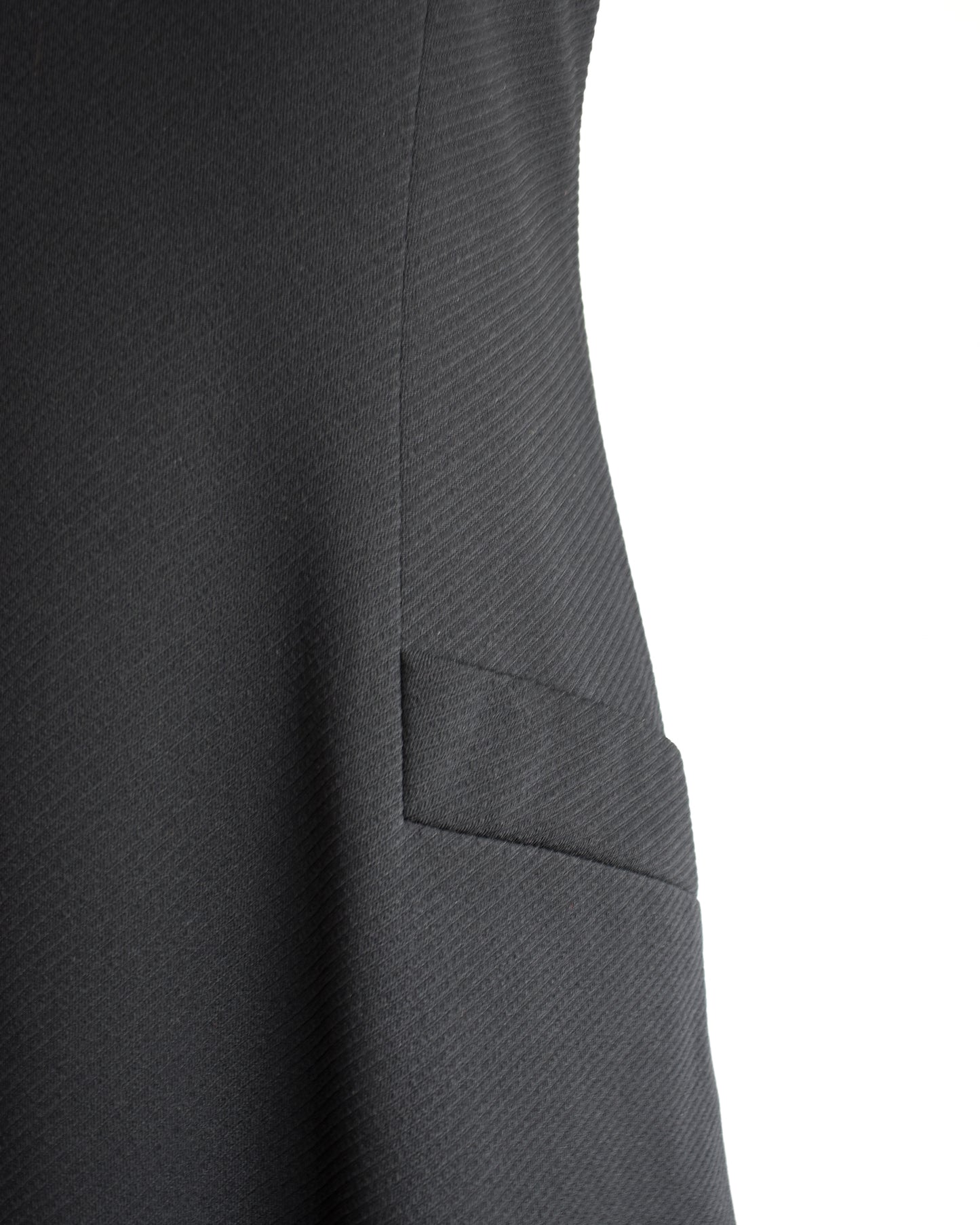 close up view of the ribbed fabric and pocket flap