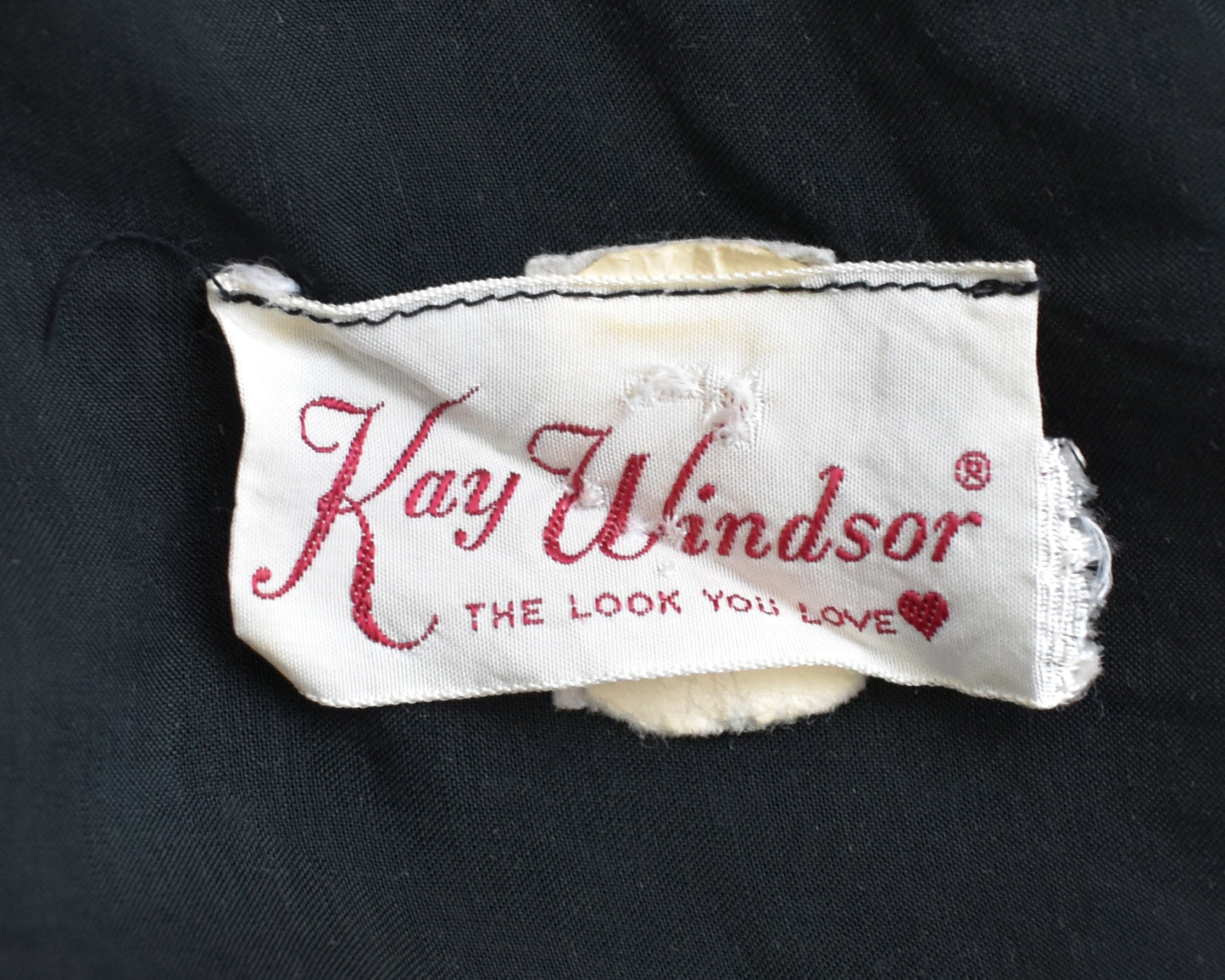 close up of the tag which says Kay Windsor