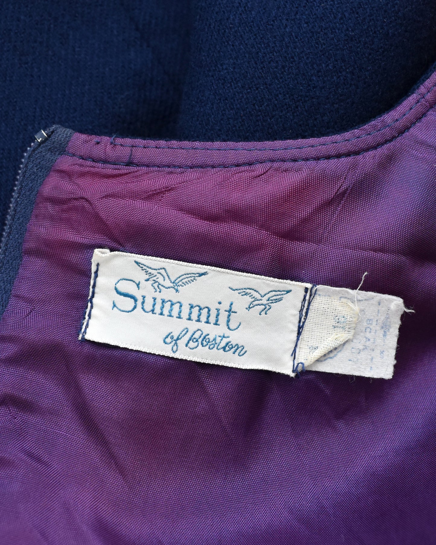 close up of the tag which says Summit of Boston