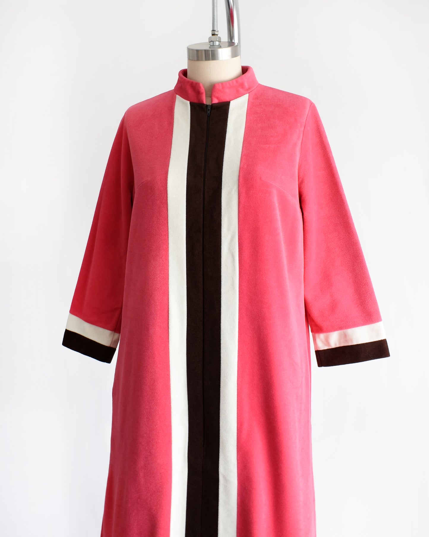 side front view of a vintage 1970s pink, white, and brown striped robe by Vanity Fair