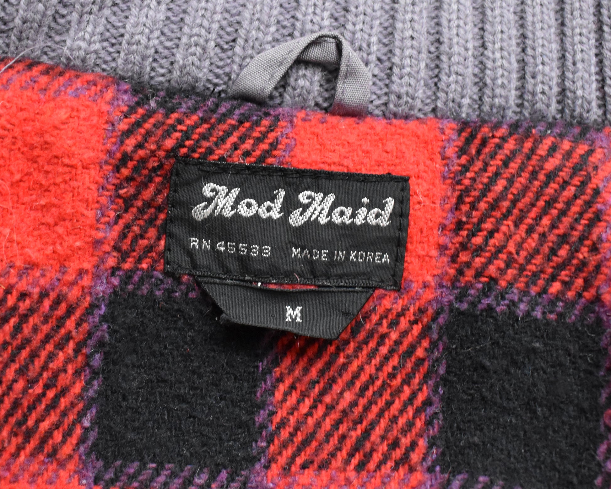 Close up of the tag that says Mod Maid