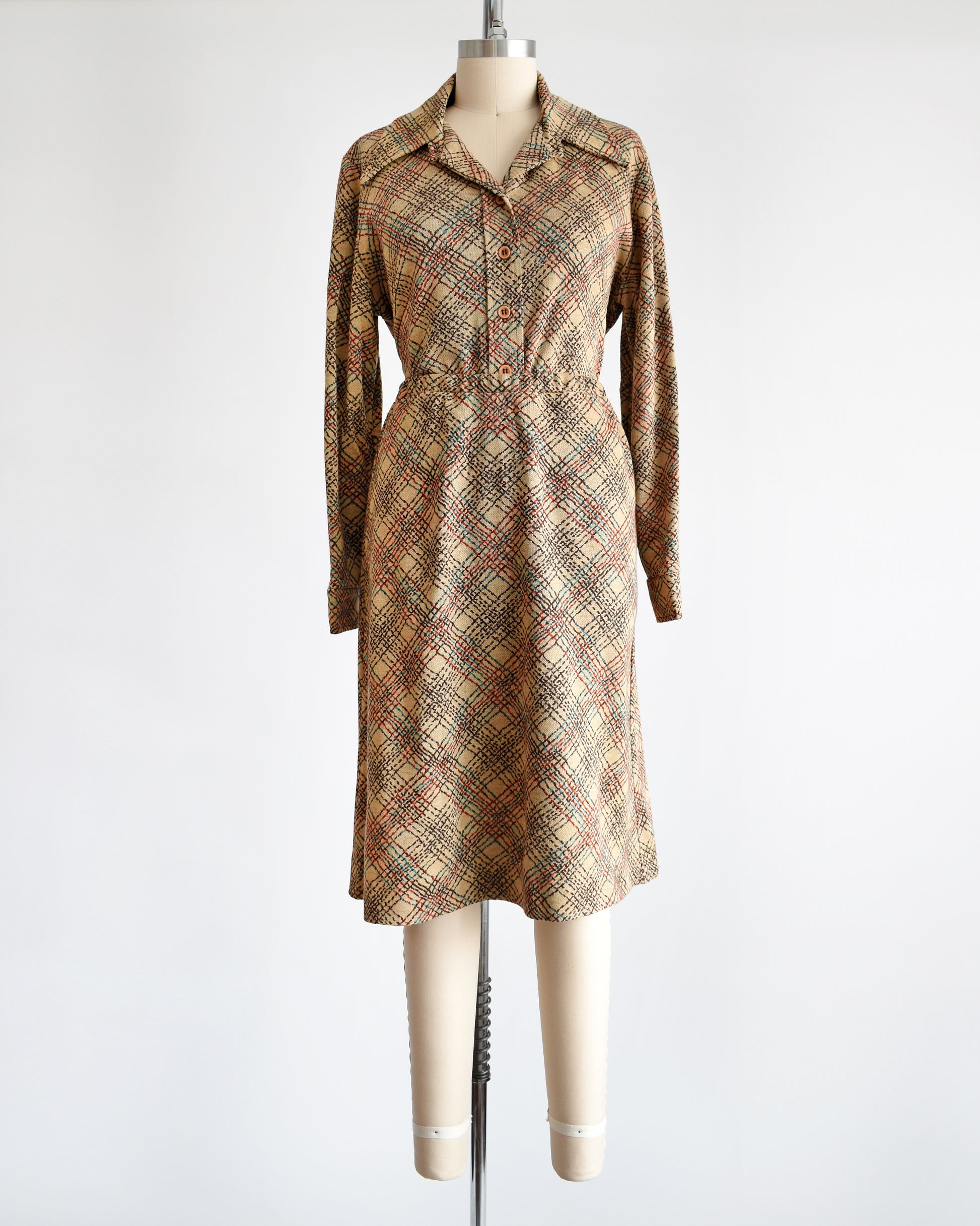 a vintage 1970s brown plaid blouse and skirt set