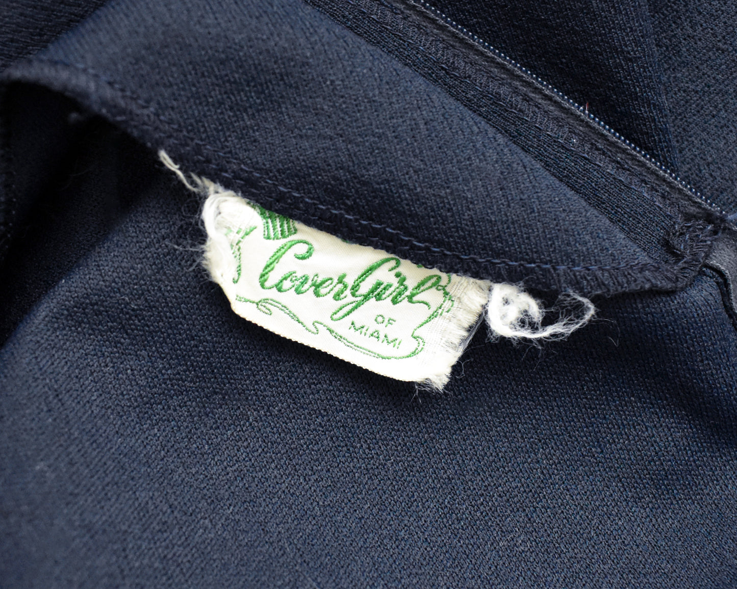 close up of the tag which says Cover Girl of Miami