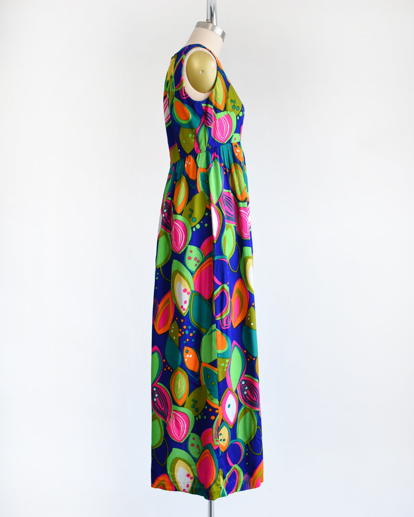 side view of a vintage 1970s psychedelic maxi dress