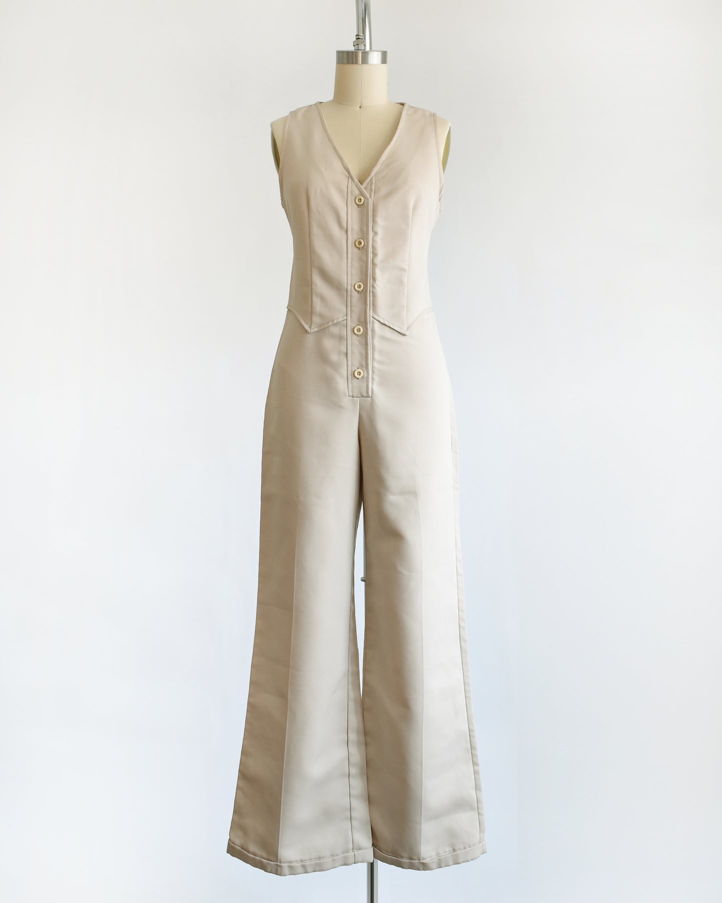 A vintage 70s light tan jumpsuit
