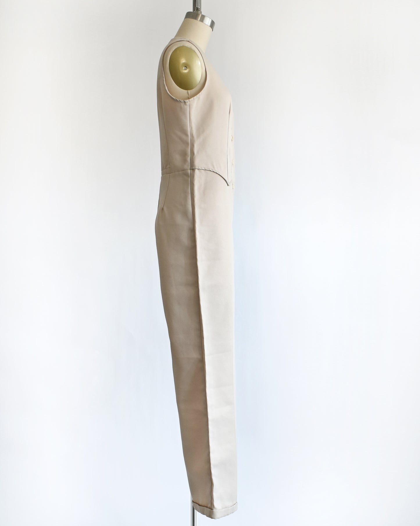 side view of a vintage 70s light tan jumpsuit