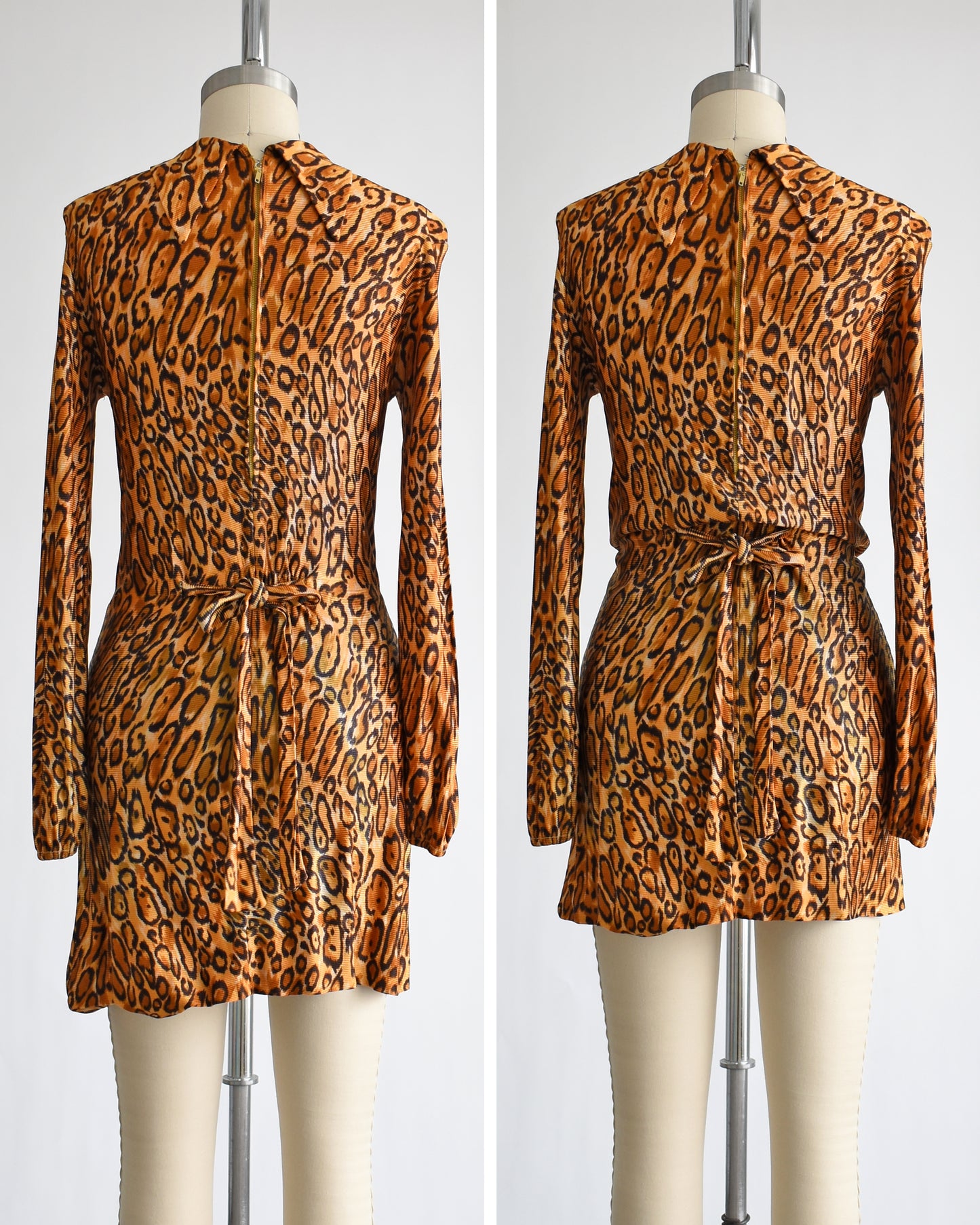 side by side back view of side by side view of a vintage 1960s leopard print mini dress. the dress on the right is pulled up via the elastic waist