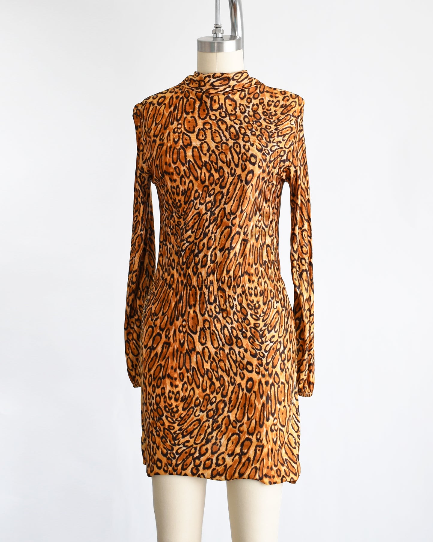 side front view of side by side view of a vintage 1960s leopard print mini dress