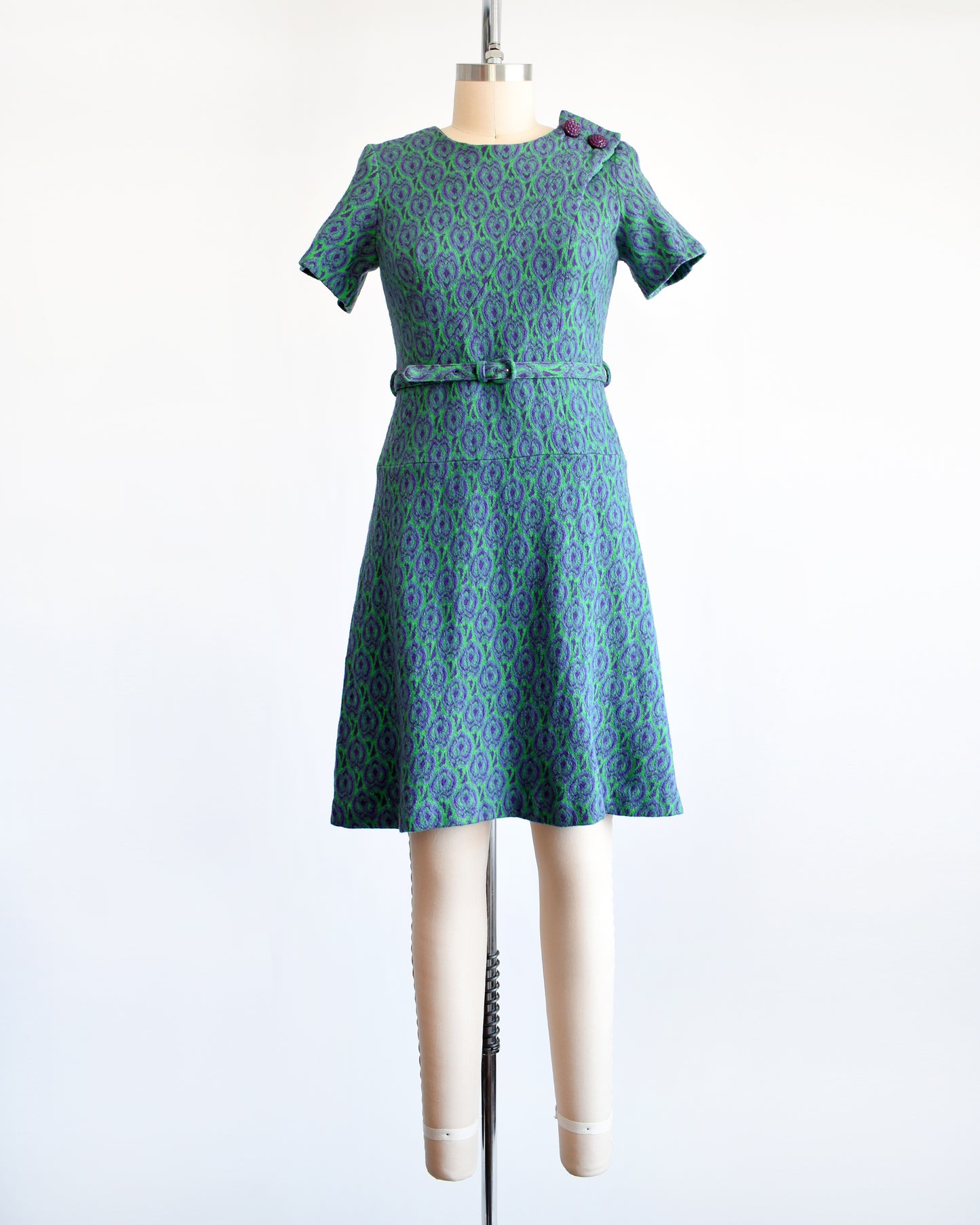 a vintage 1960s green and purple drop waist dress and matching belt