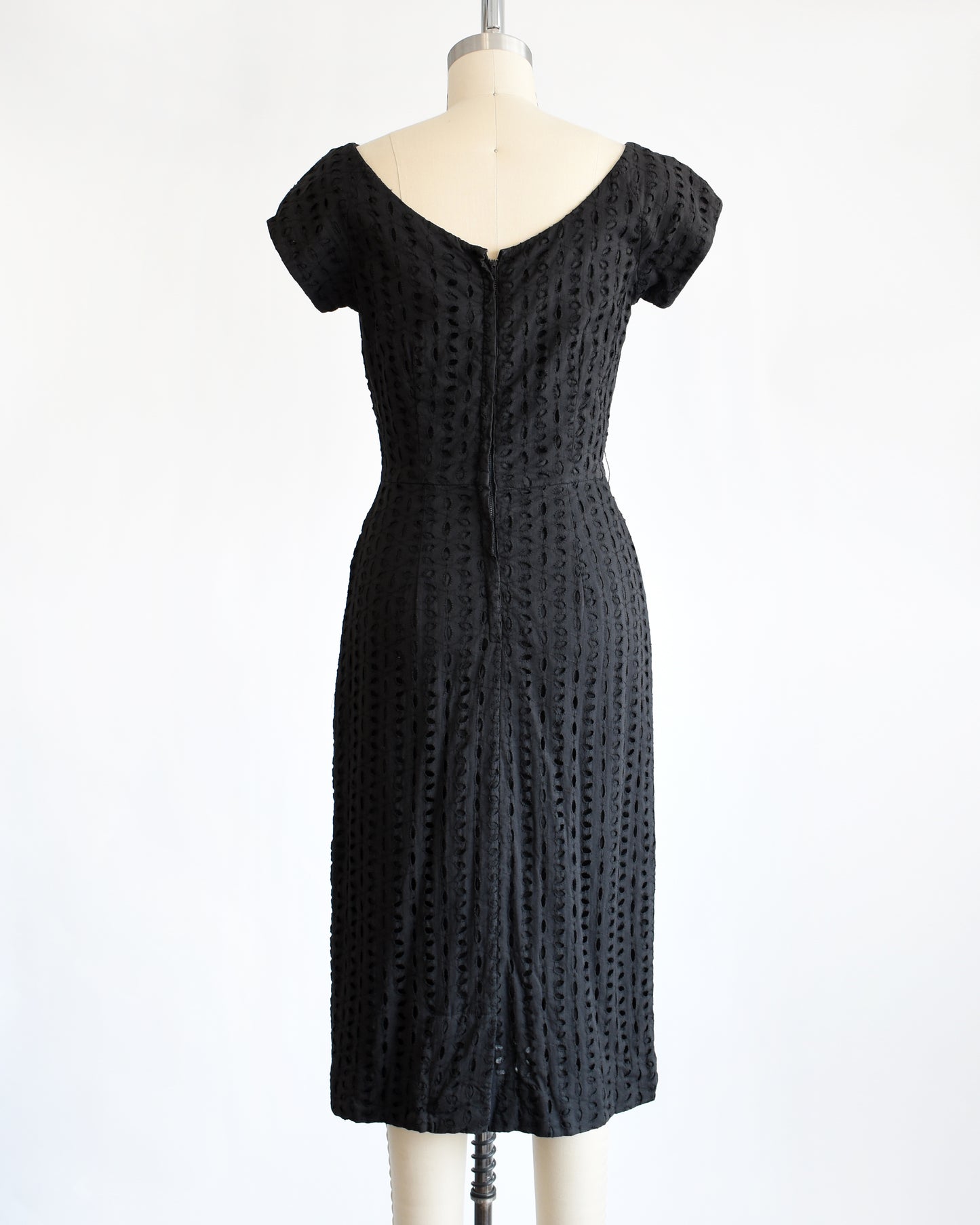 back view of vintage 1960s black eyelet dress
