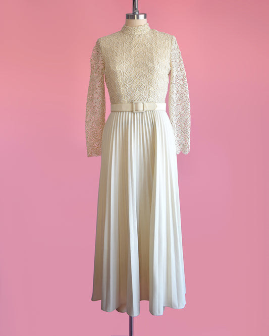 a vintage 1970s crochet floral lace pleated maxi dress with matching belt