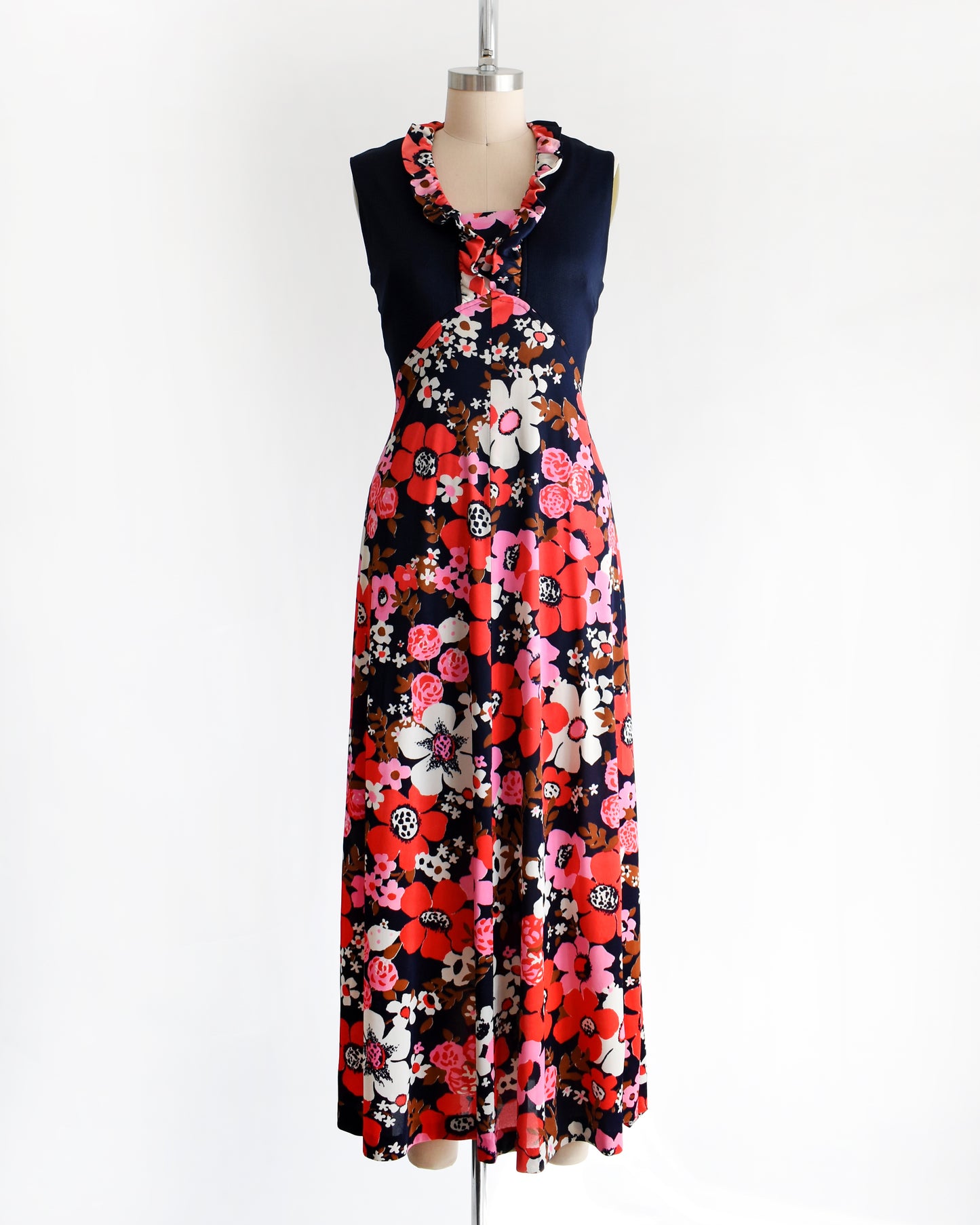 a vintage 1970s navy and pink flower power maxi dress