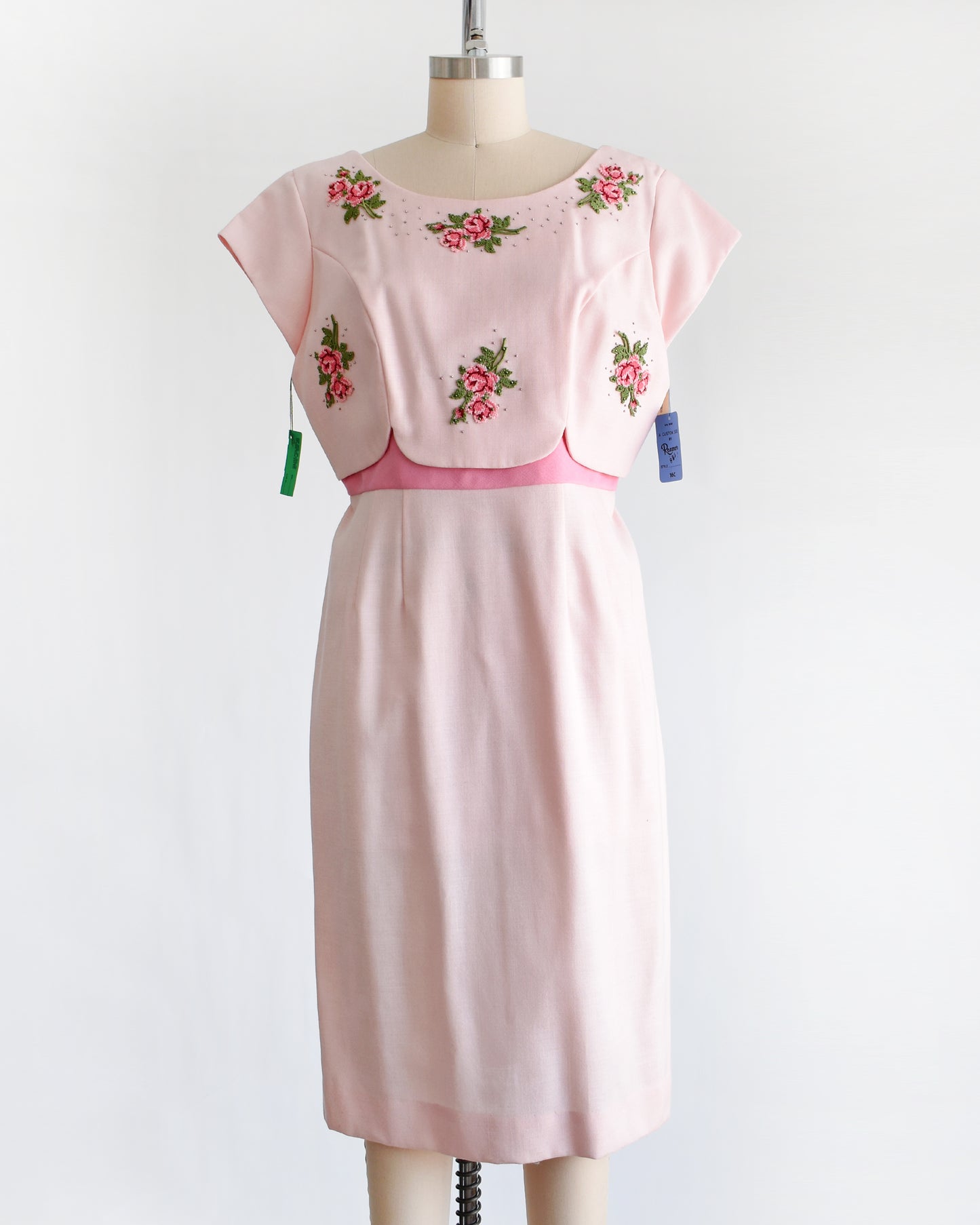 a vintage 1960s pink floral embroidered dress