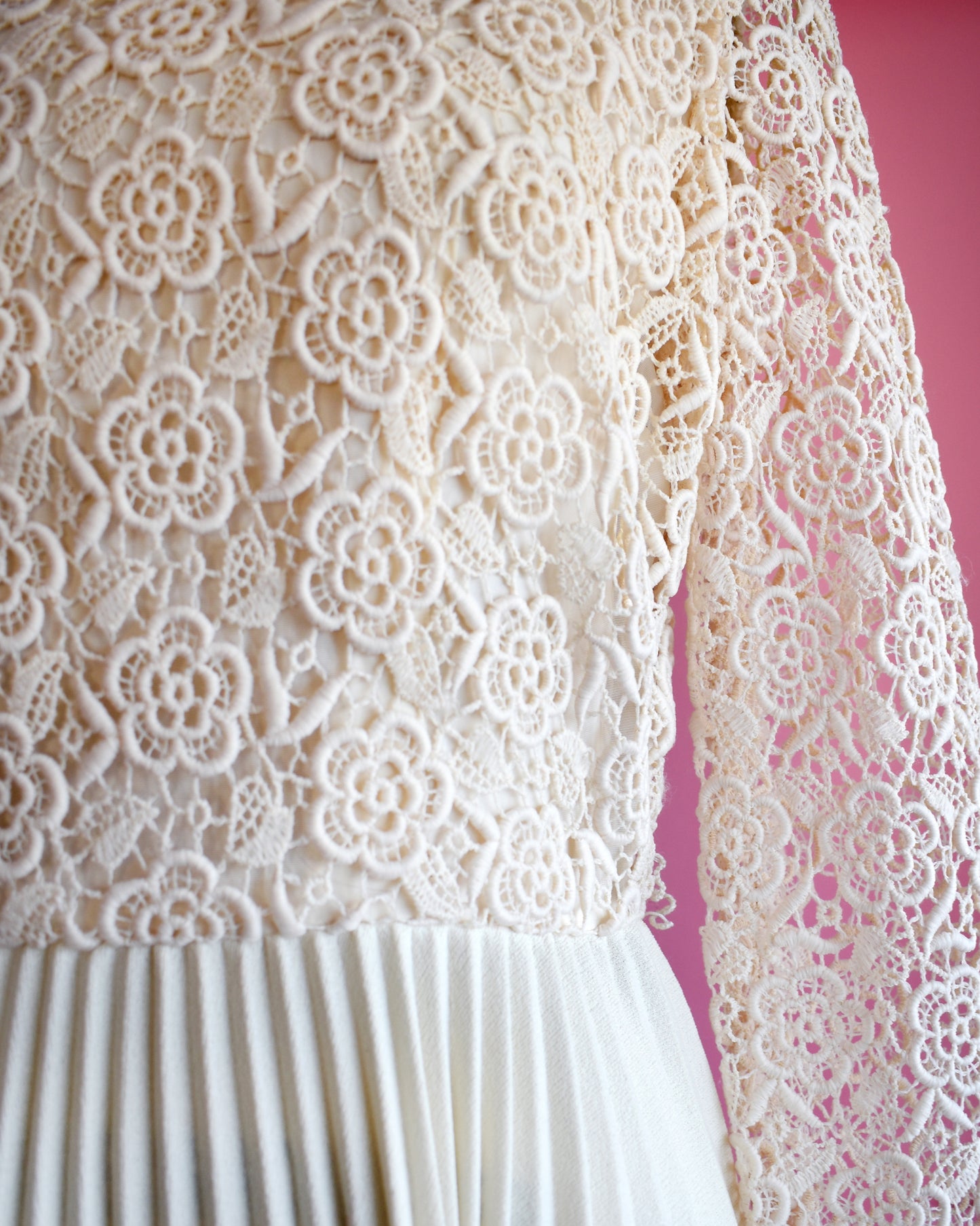close up of the cream crochet floral lace on the bodice