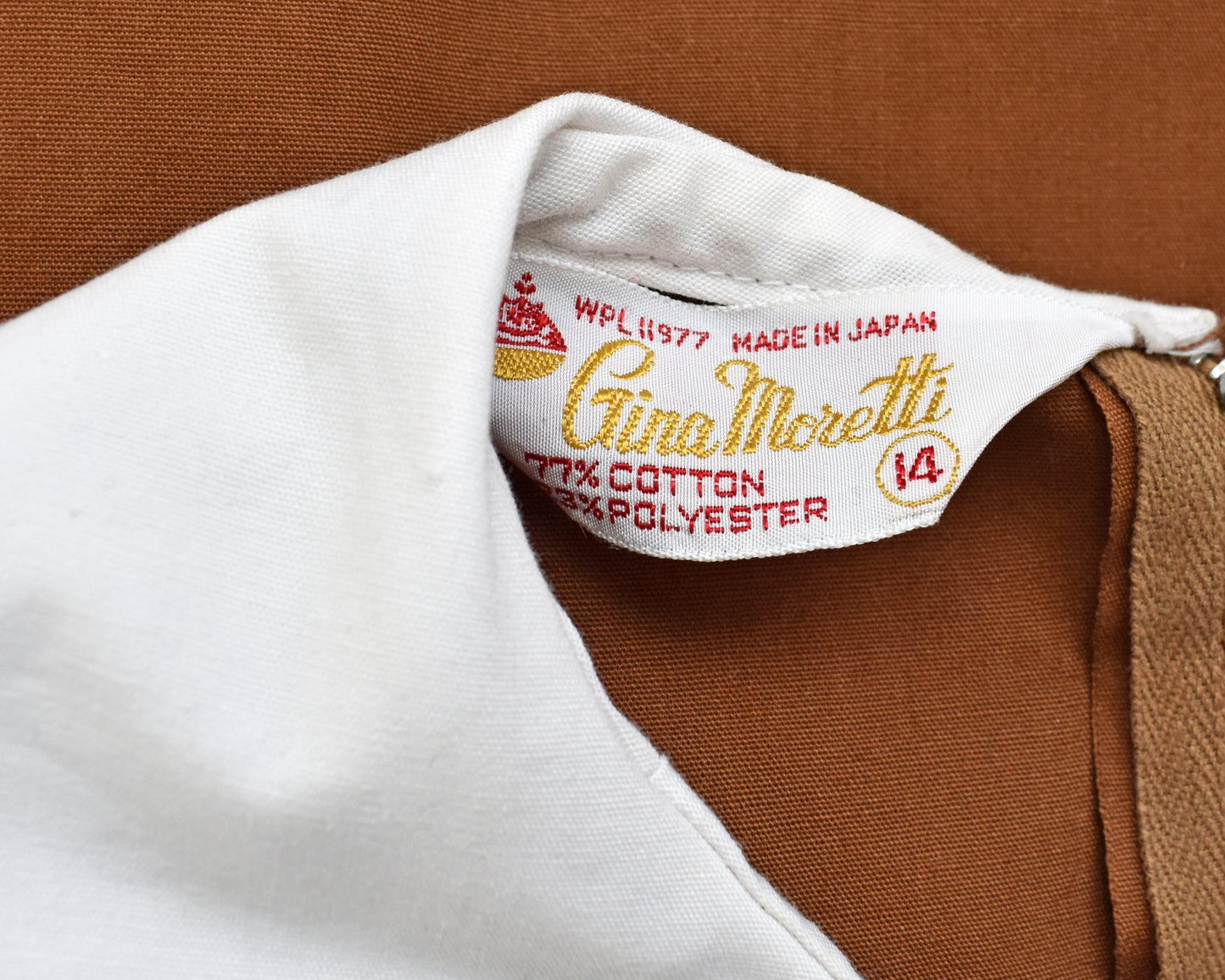 close up of the tag which says Gina Moretti