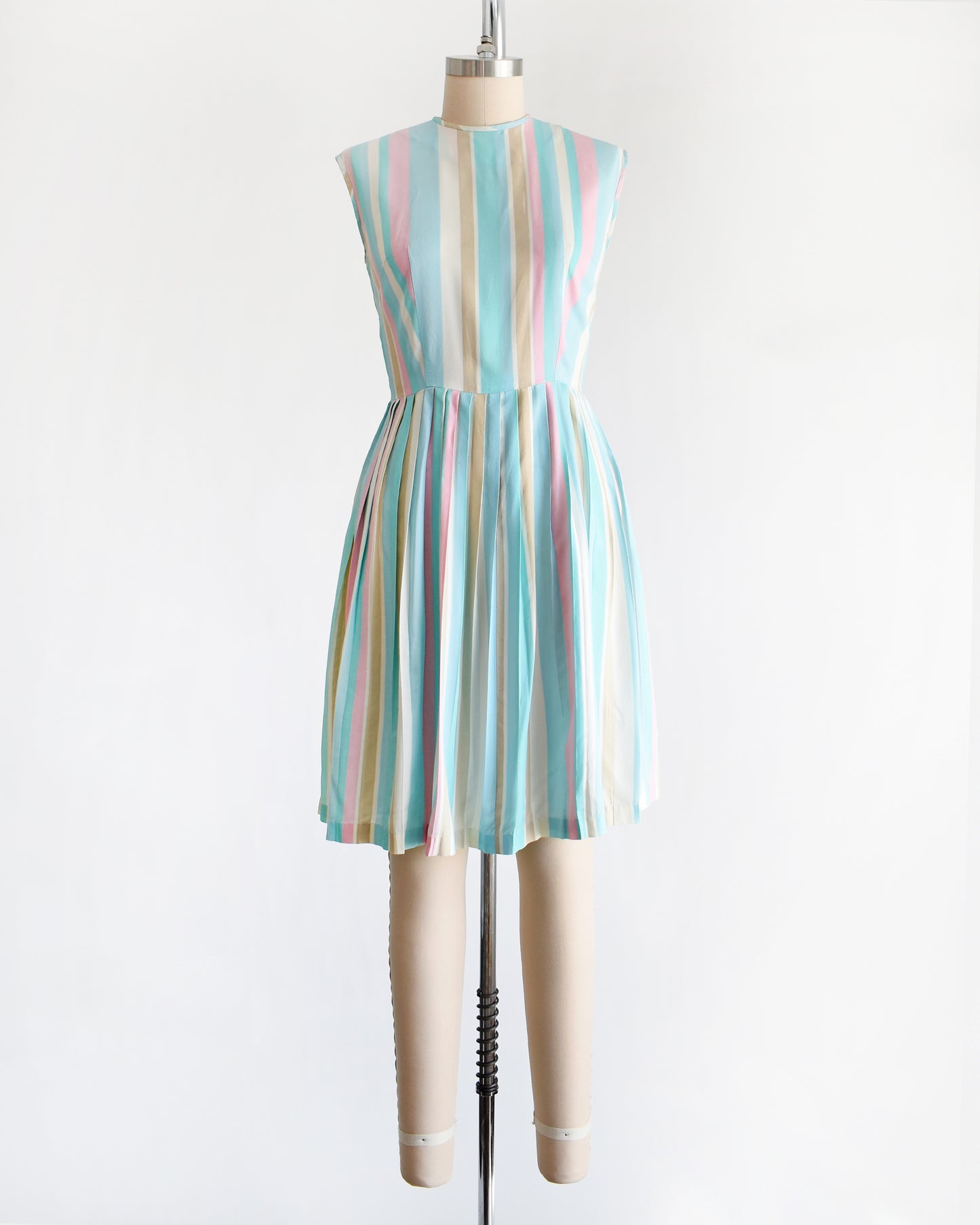 a vintage 1960s striped pastel rainbow dress