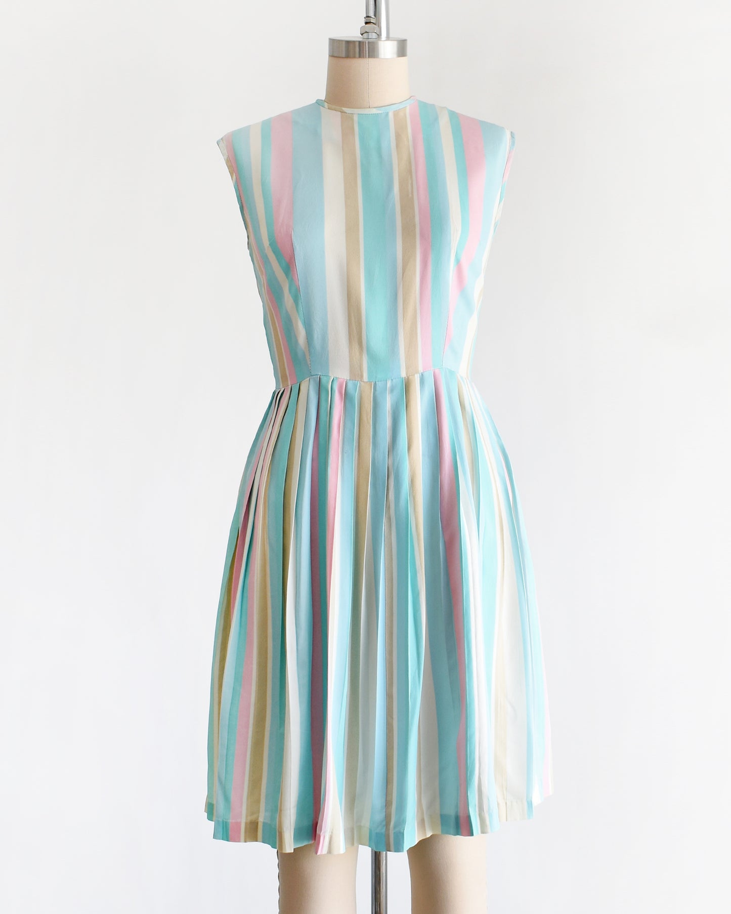 a vintage 1960s striped pastel rainbow dress