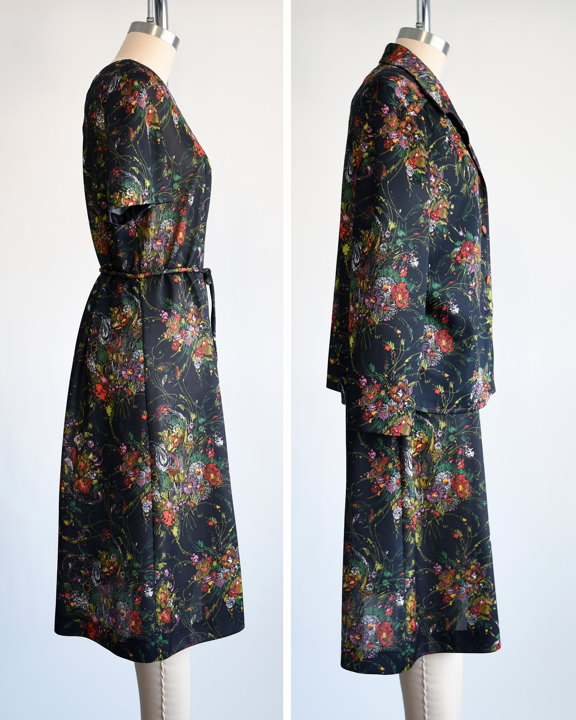 side by side views of a vintage 1970s black floral dress set that comes with a dress, a matching top, and belt