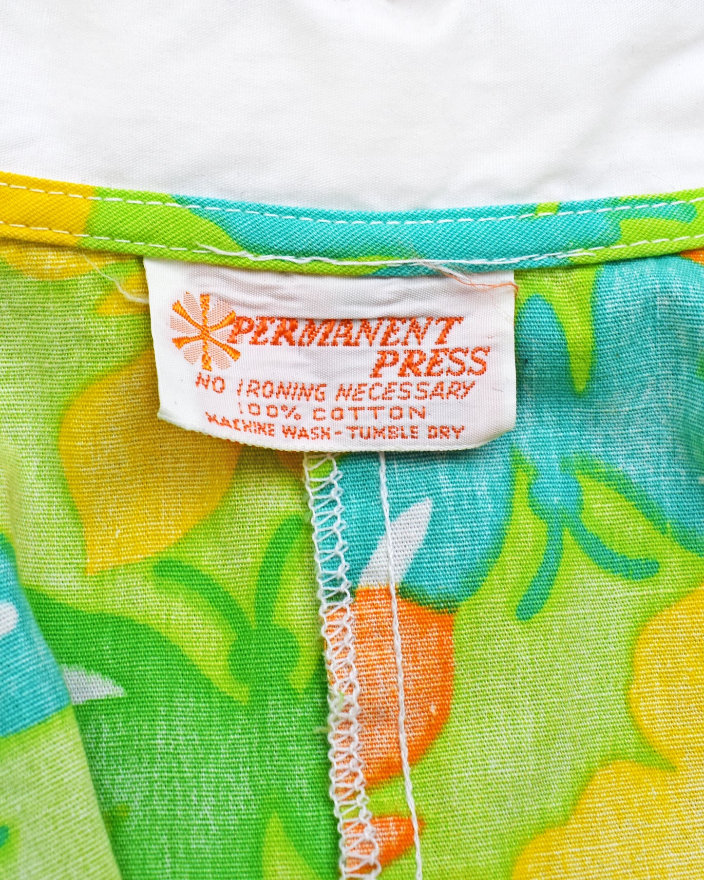 close up of the tag which says Permanent Press
