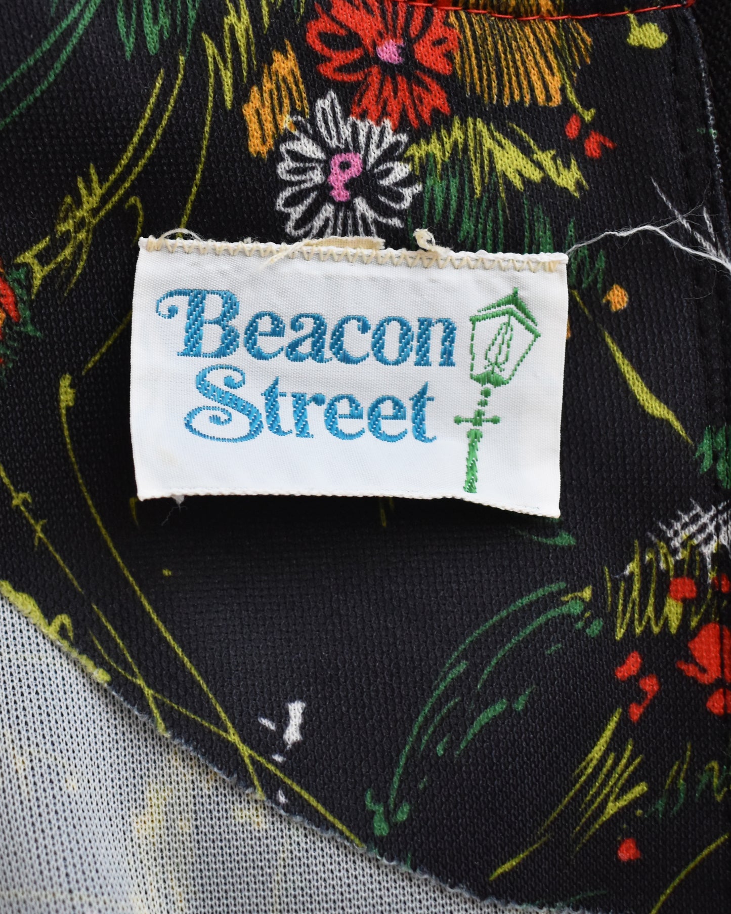 close up of the tag that says Beacon Street