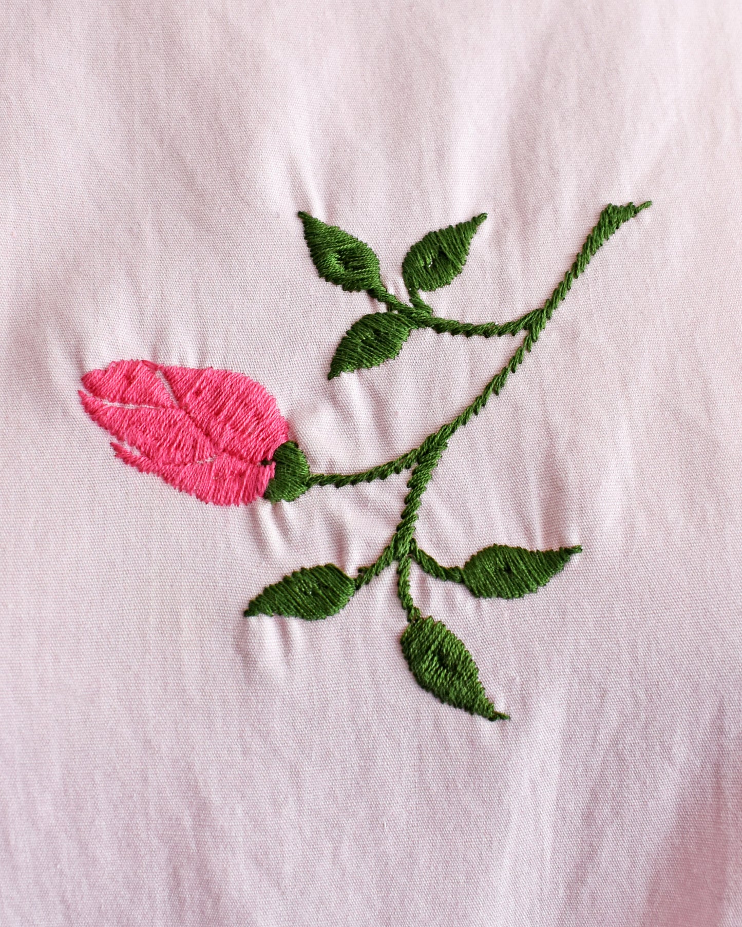 close up of the embroidered flower