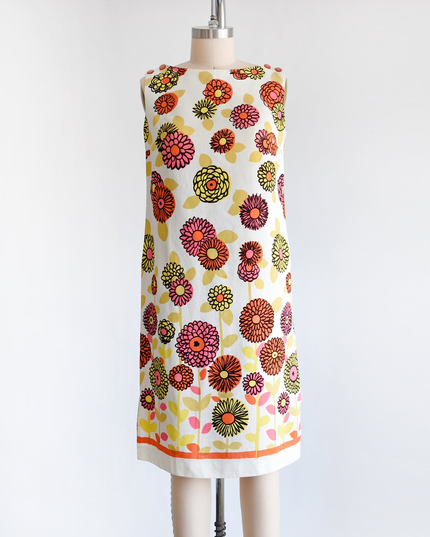 a vintage 1960s flower power shift dress