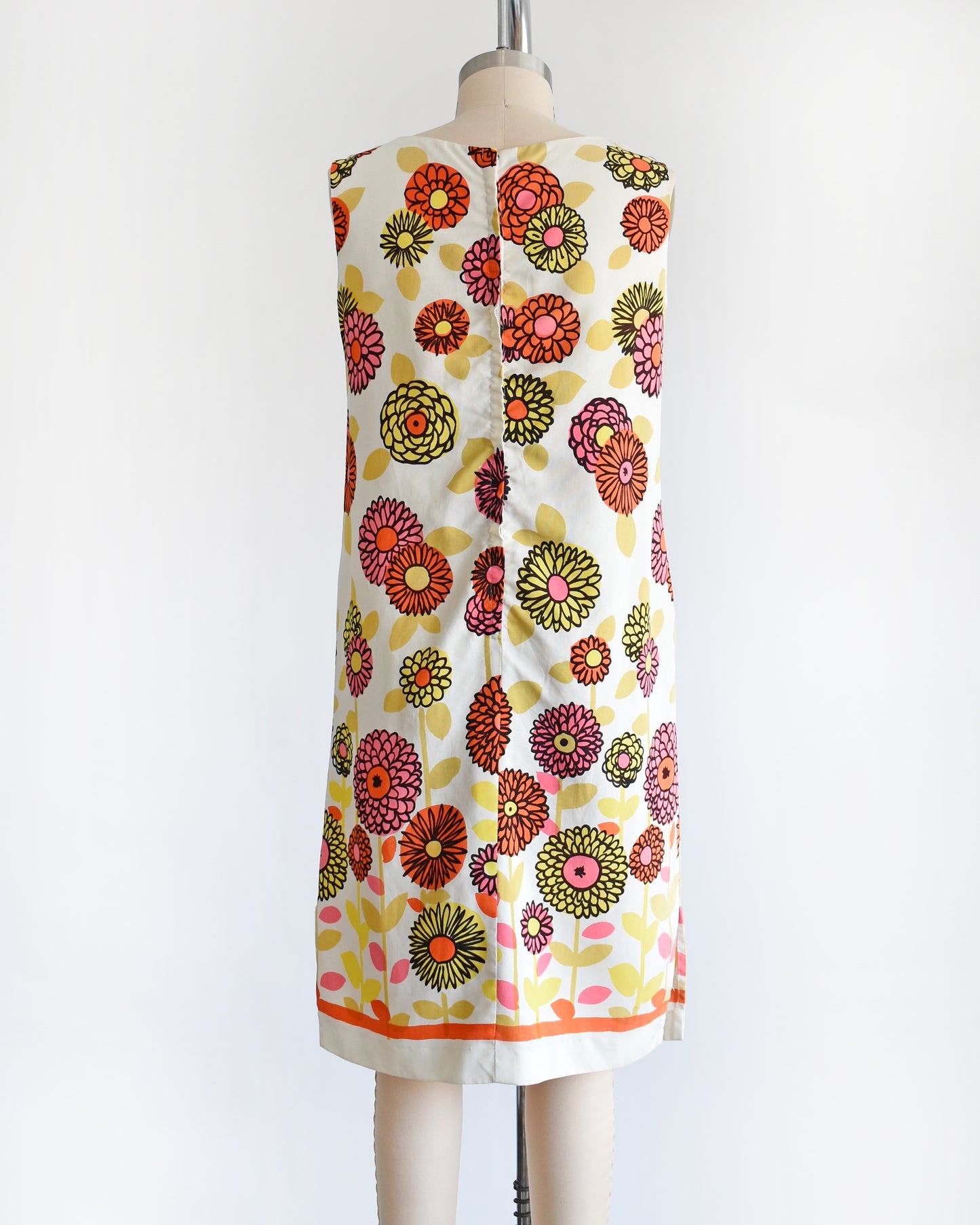back view of a vintage 1960s flower power shift dress
