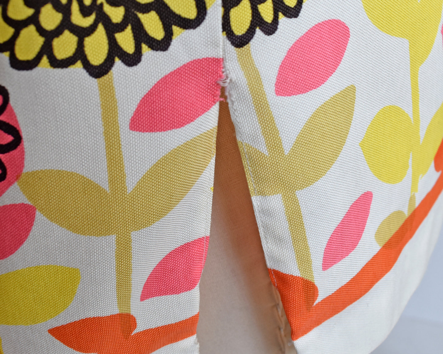 close up of a frayed seam on the side slit