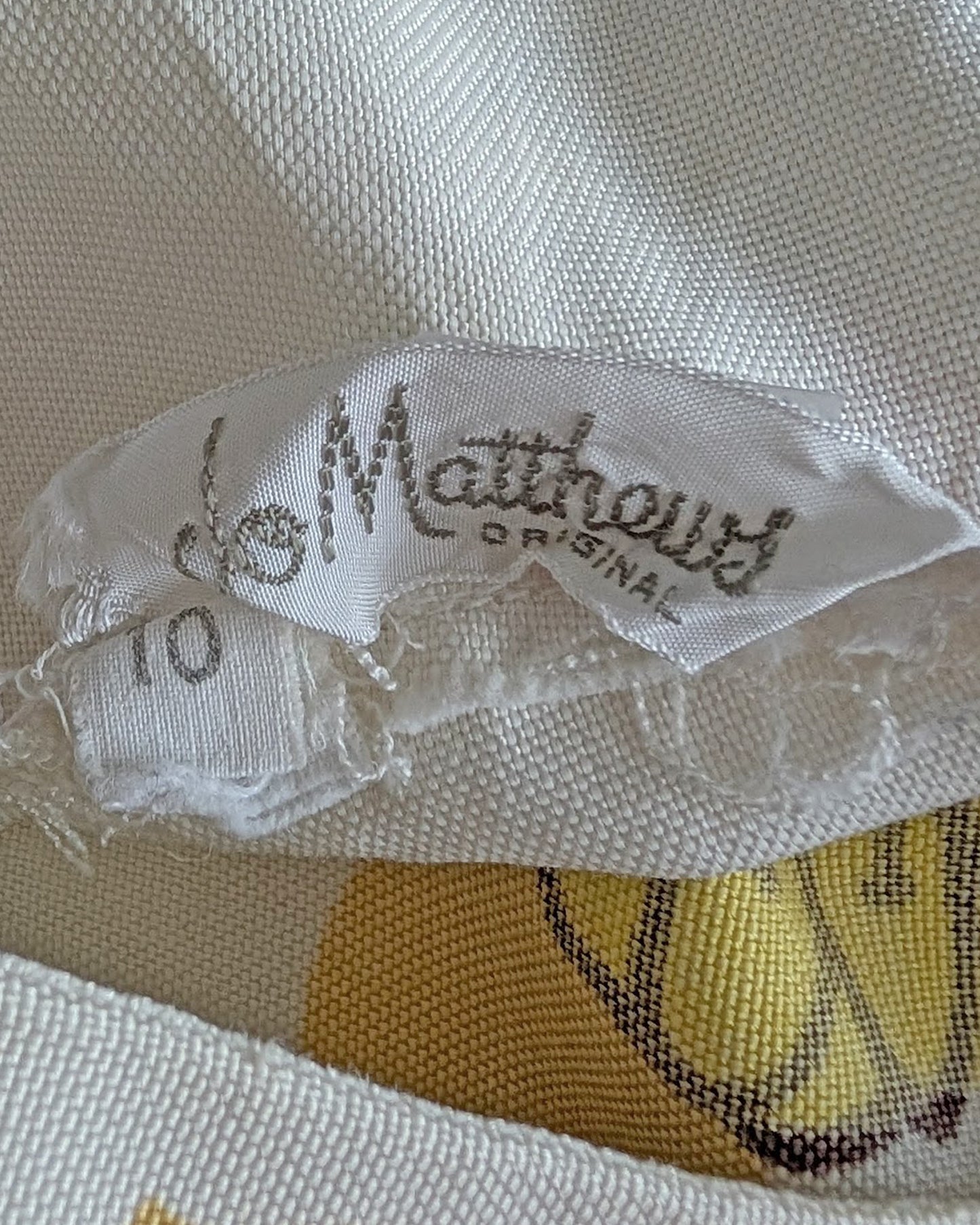 close up of the tag which says Jo Matthews