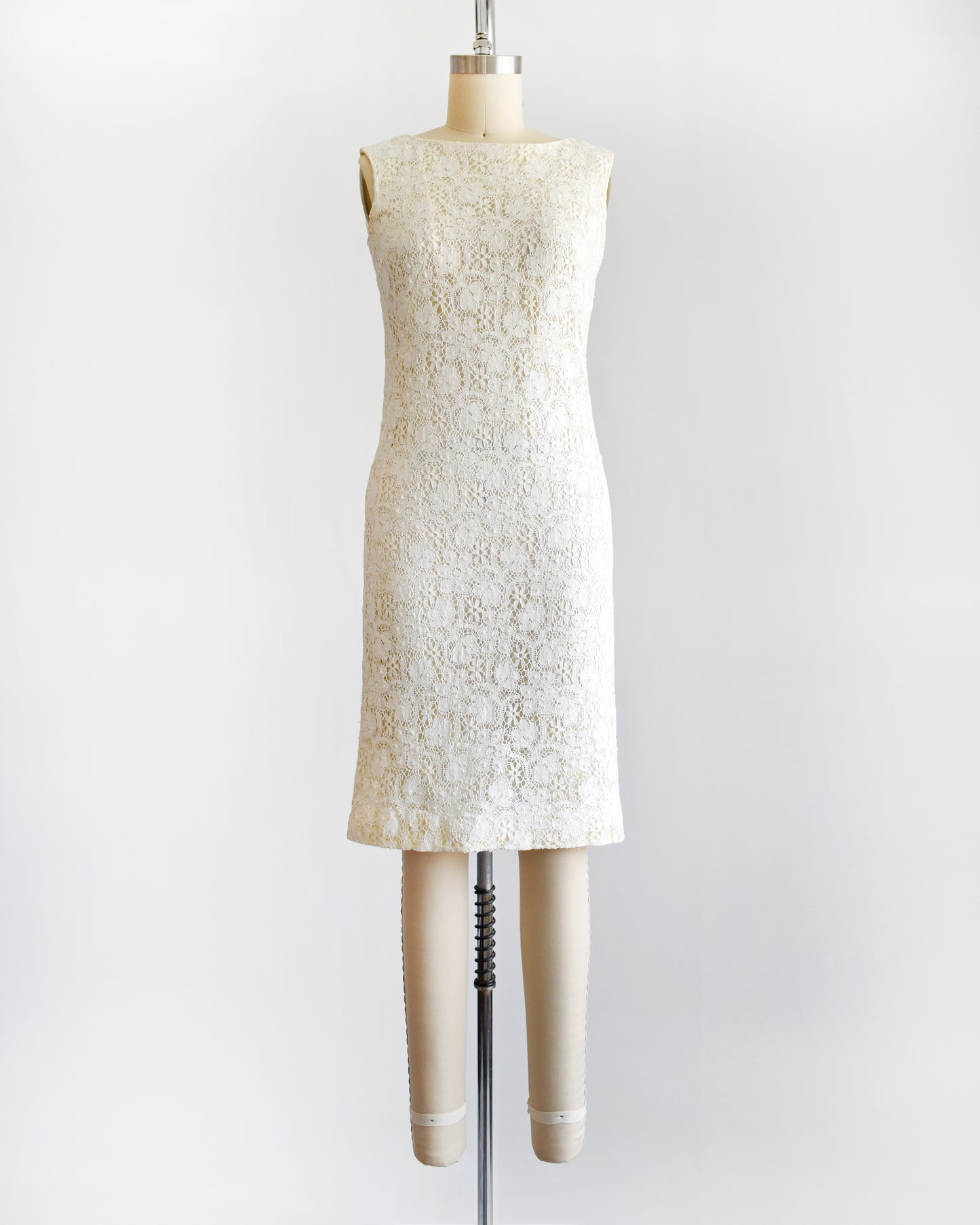 a vintage 1960s floral cream lace dress