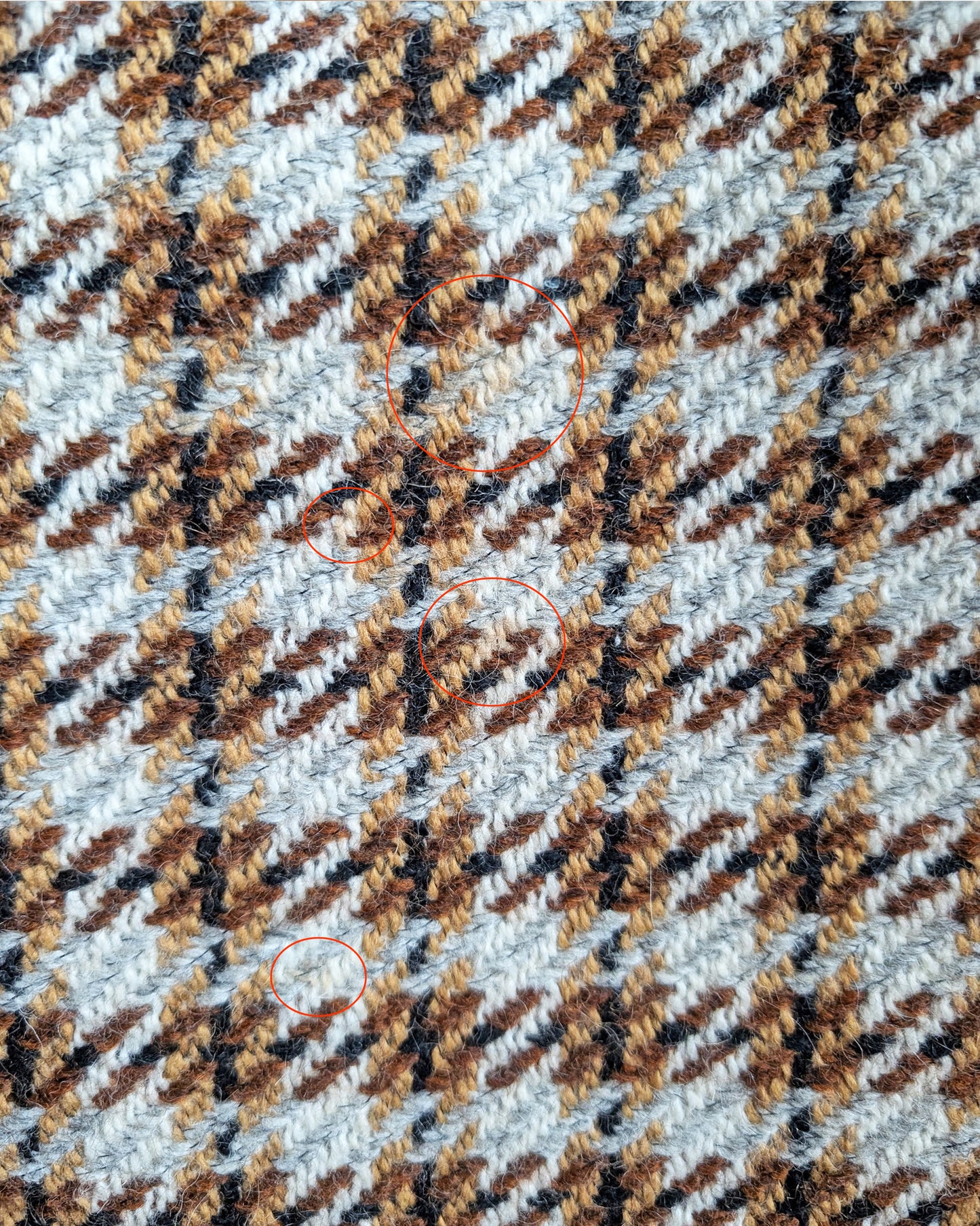 a close up photo showing some small stains on the front of the skirt