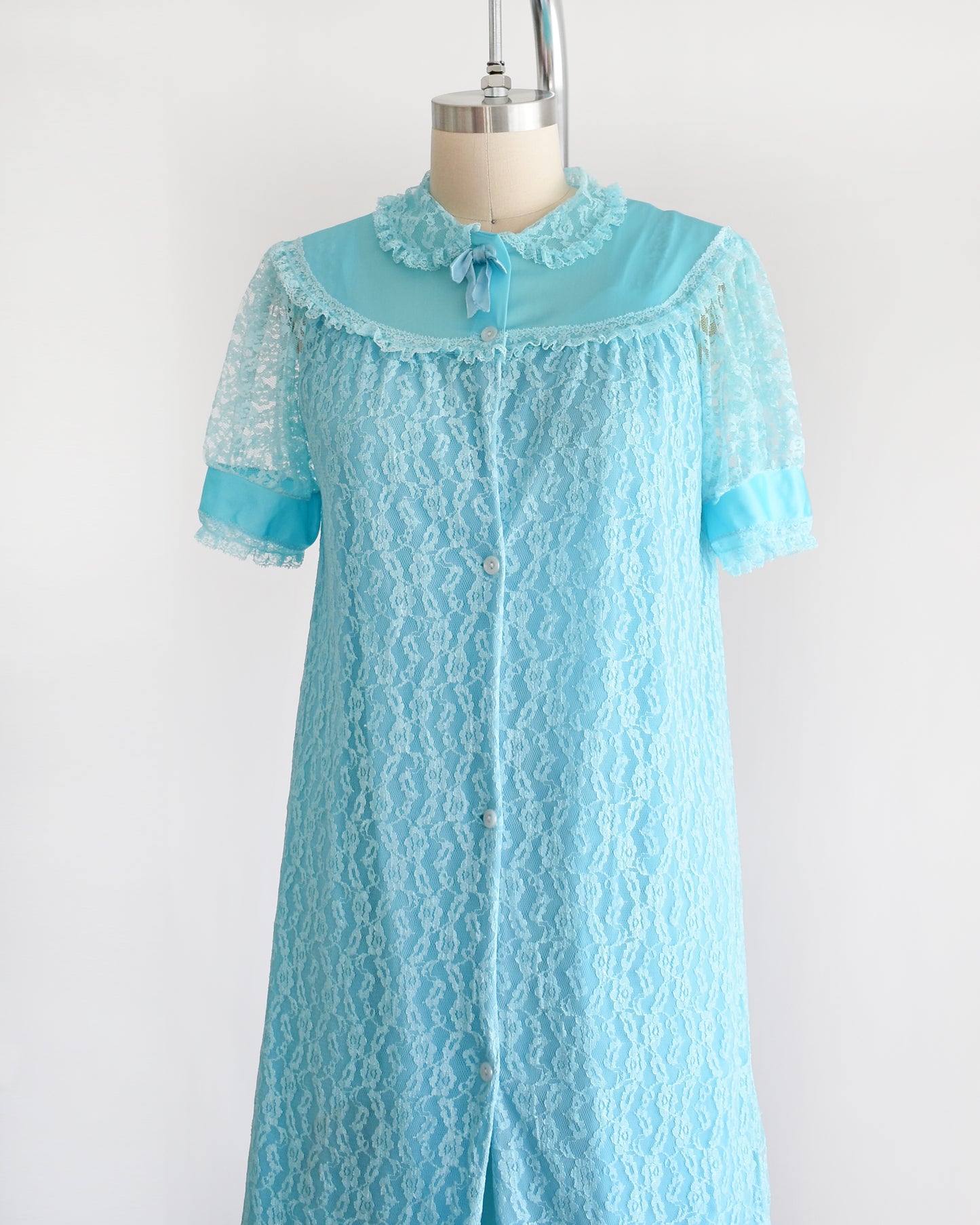 Side view of a vintage 1960s aqua blue peignoir set 