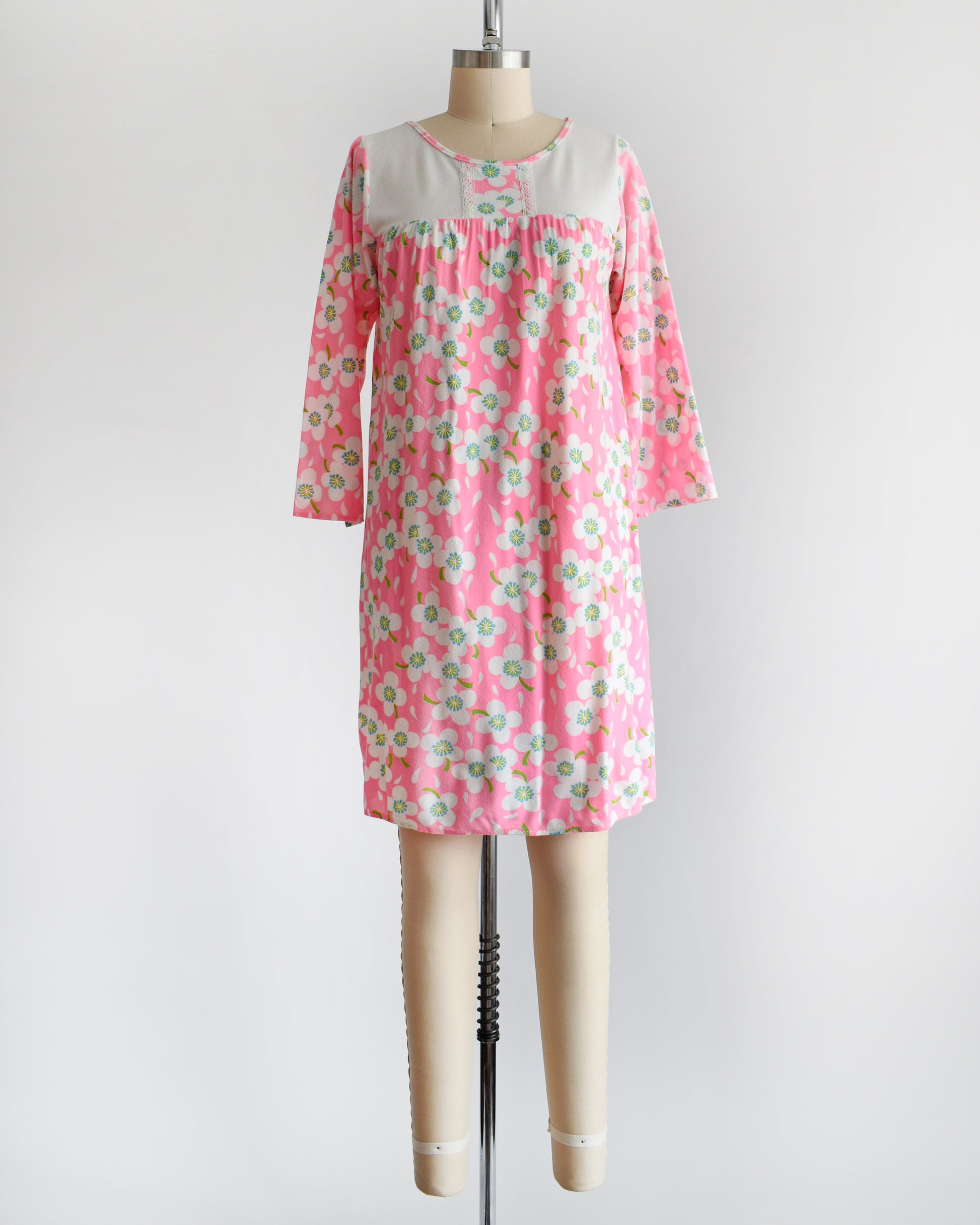 a vintage 1970s pink flower power nightgown