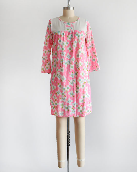 a vintage 1970s pink flower power nightgown