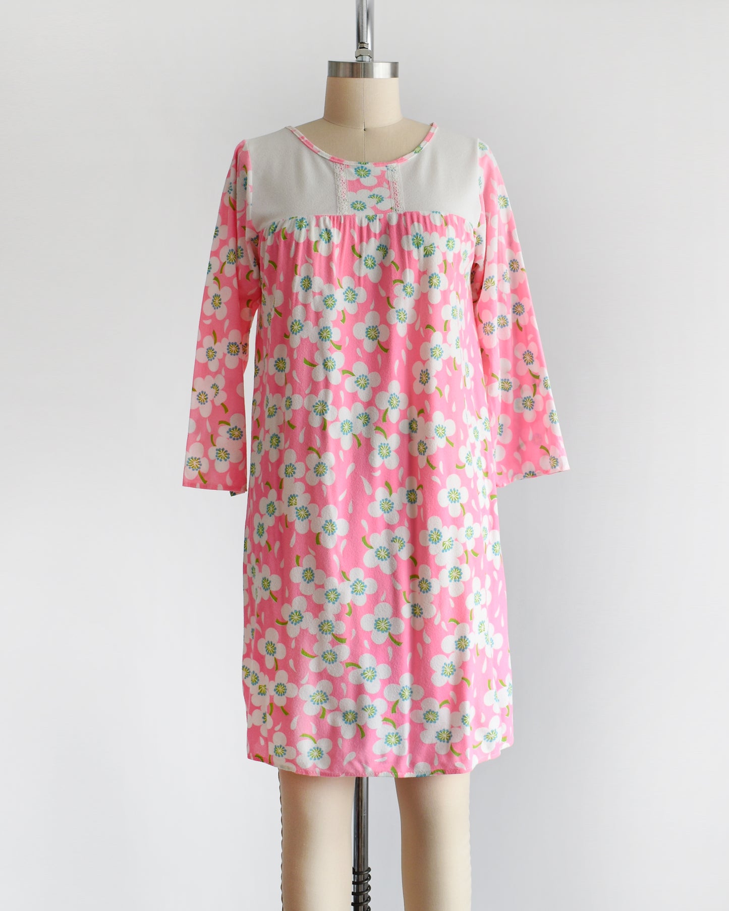 a vintage 1970s pink flower power nightgown