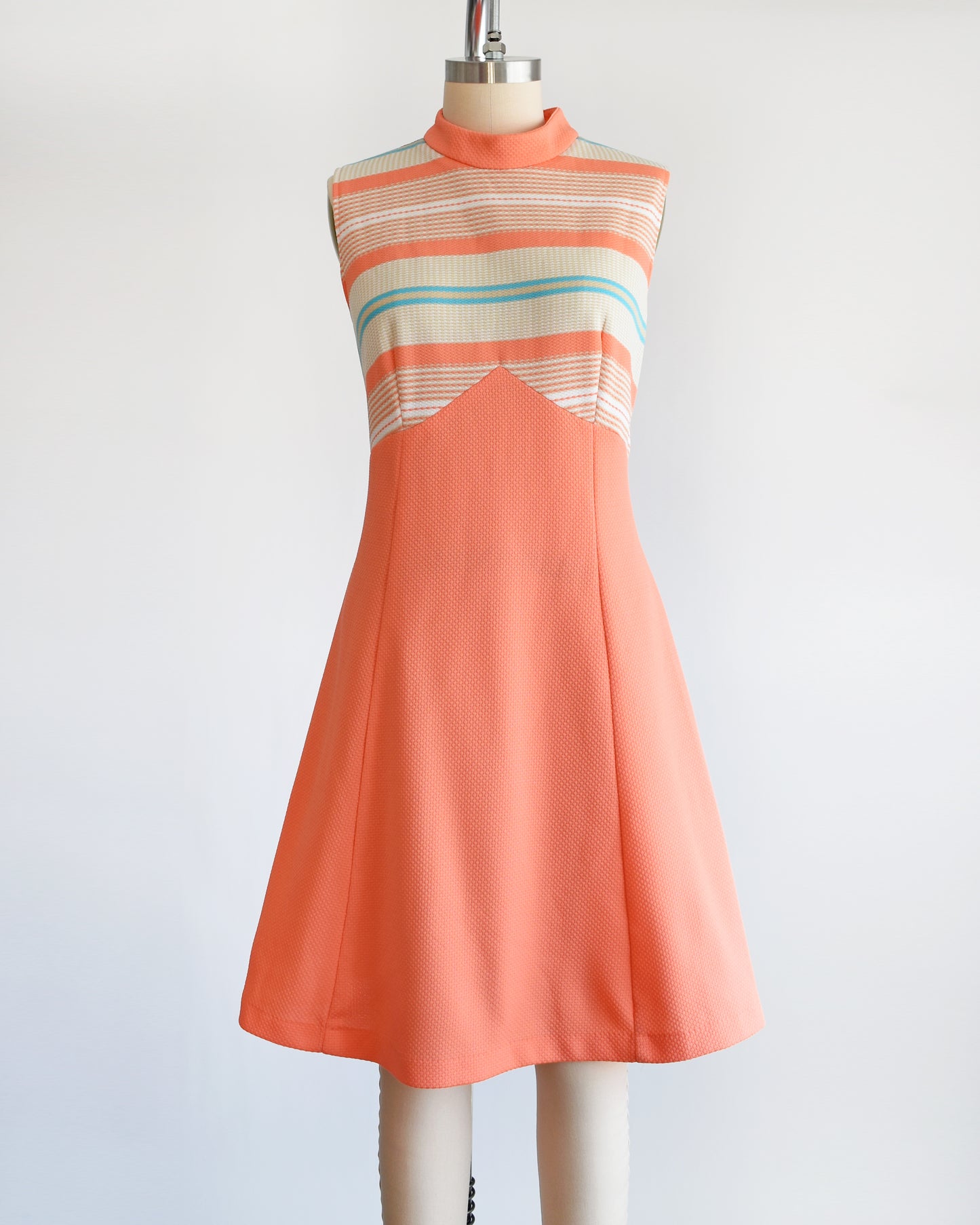 A vintage 1970s peach and blue mod dress
