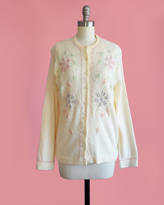 a vintage 1960s cream beaded floral cardigan.