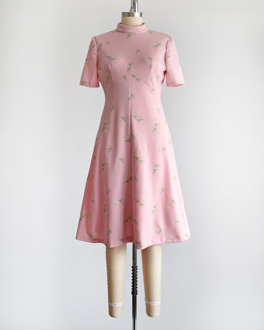 a vintage 1960s pink and white floral mod dress.